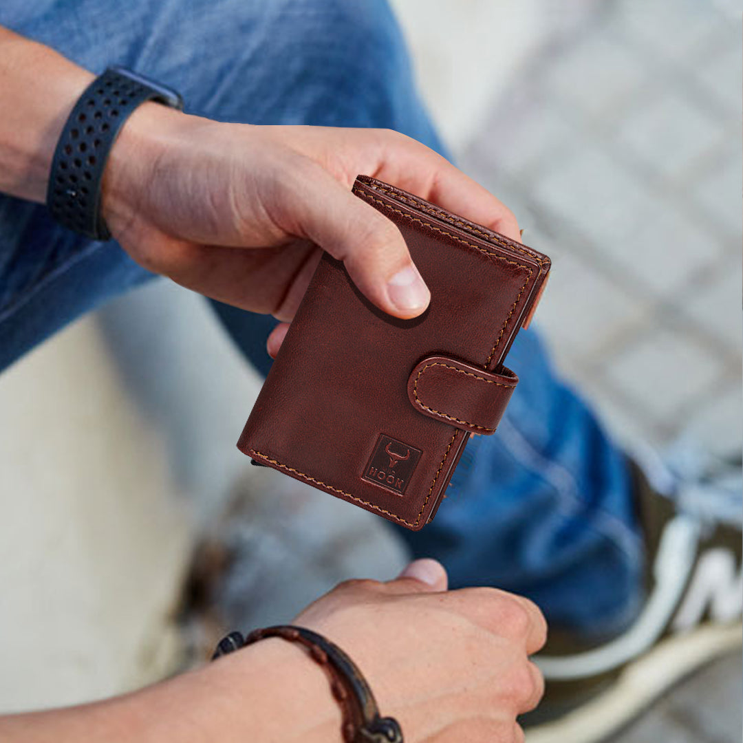 Card Swipe Wallet featuring a sleek metallic aluminum body and genuine leather accents, designed for style and security.