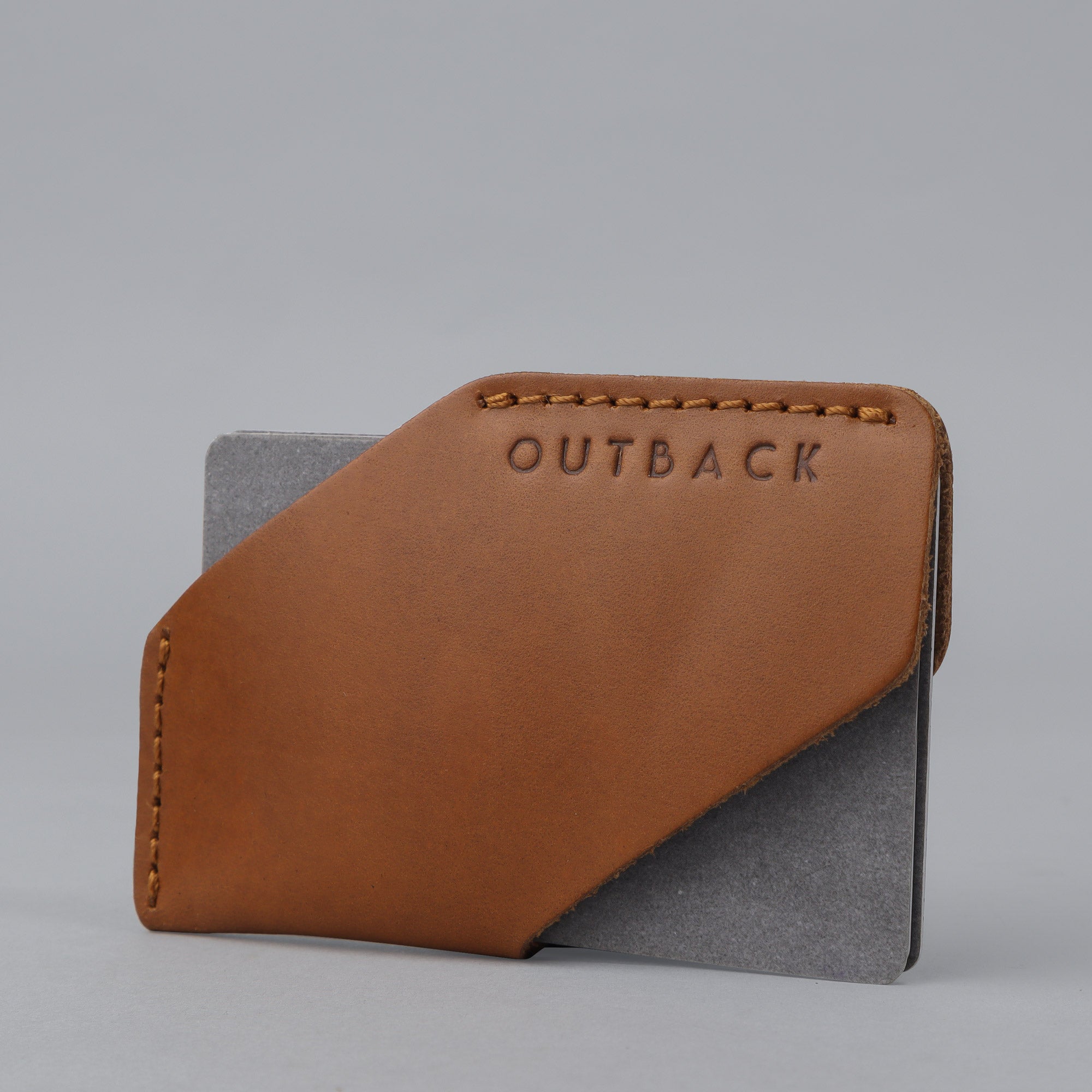 Elegant leather Cards Sleeve holding credit cards and IDs, showcasing its handcrafted design and durable material.