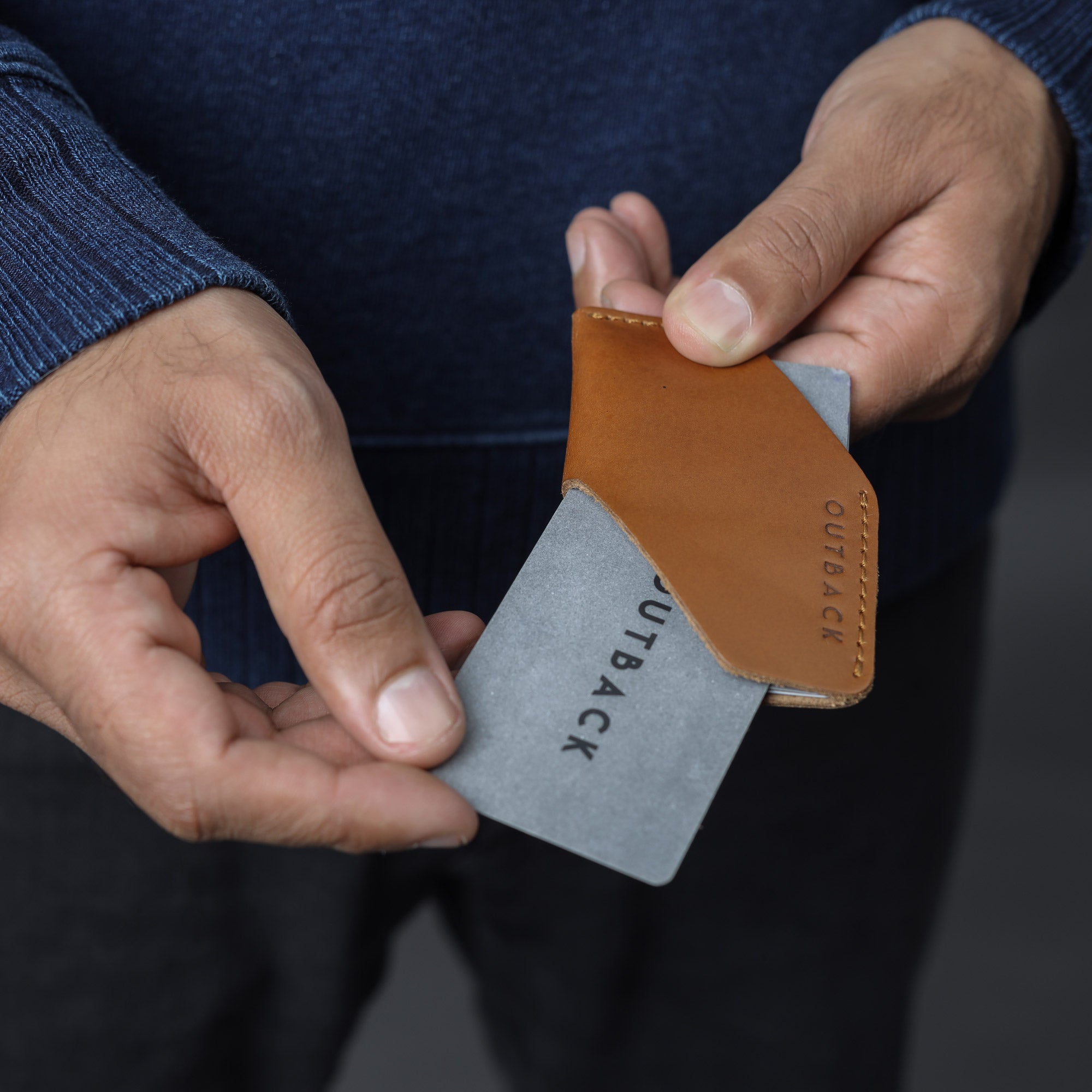 Elegant leather Cards Sleeve holding credit cards and IDs, showcasing its handcrafted design and durable material.