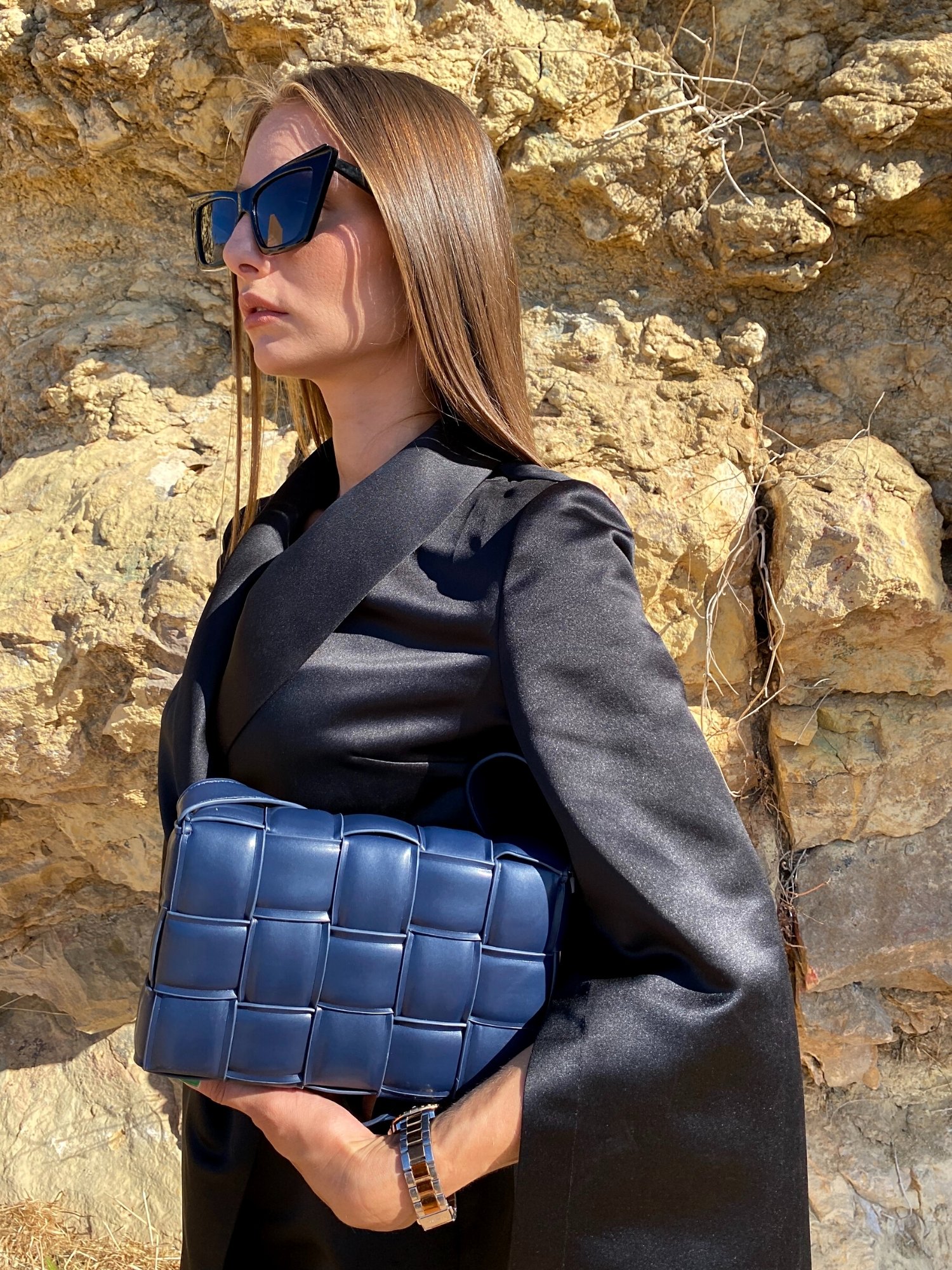 Blue Cassette Shoulder Bag with quilted flap and adjustable strap, featuring a lined interior and magnetic closure.