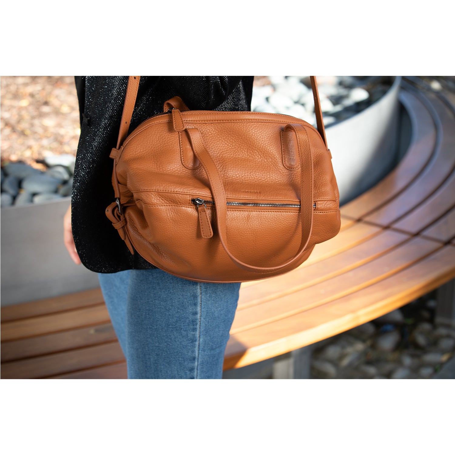 Catherine Leather Satchel Bag in Brown with double top handle and crossbody strap, featuring a spacious interior and light gold hardware.