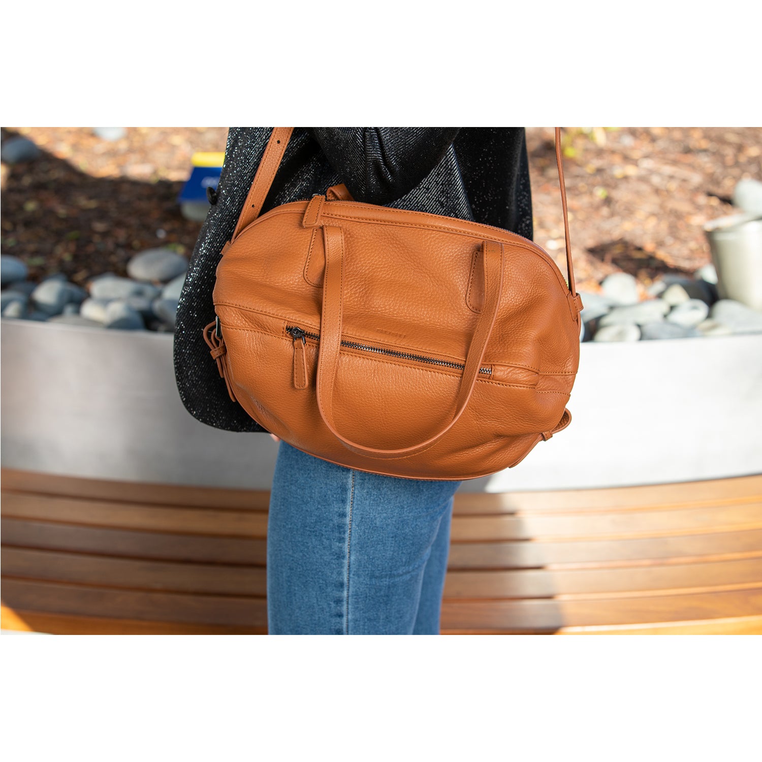 Catherine Leather Satchel Bag in Brown with double top handle and crossbody strap, featuring a spacious interior and light gold hardware.