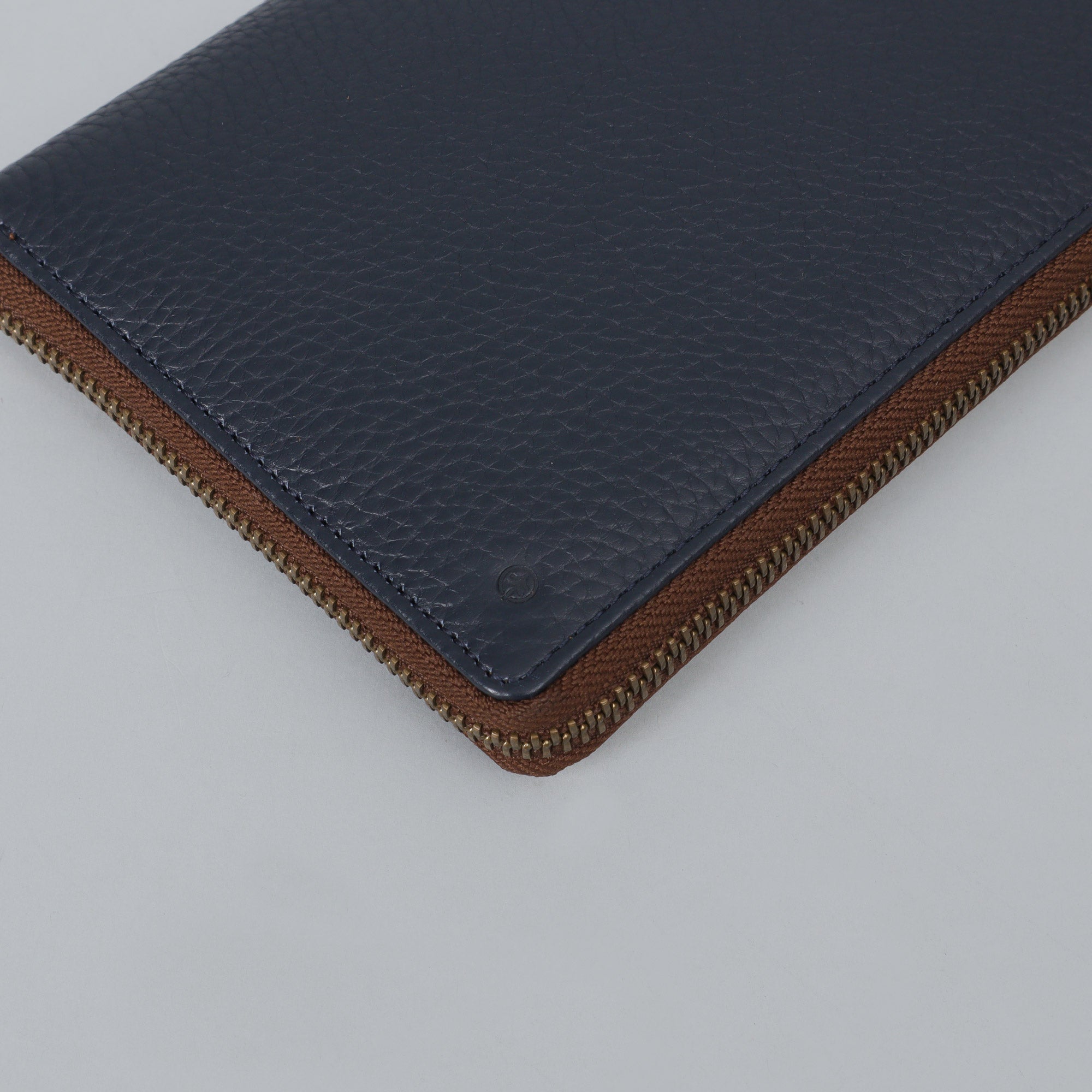 A stylish Cheque Book Leather Wallet made from premium full grain leather, featuring multiple card pockets and a secure zipper closure.