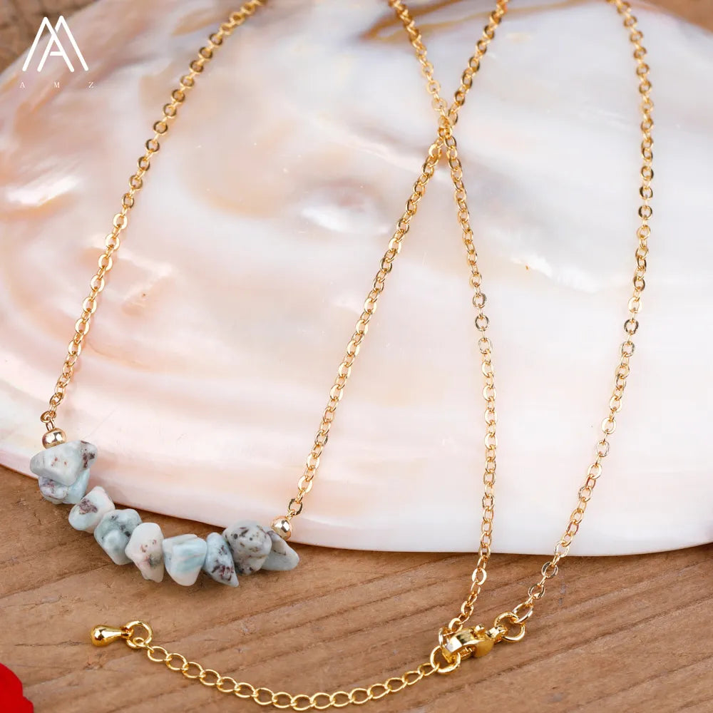 Chic Crystal Necklace featuring a trendy moon design with vibrant gemstones including turquoise, rose quartz, and opal, perfect for women.