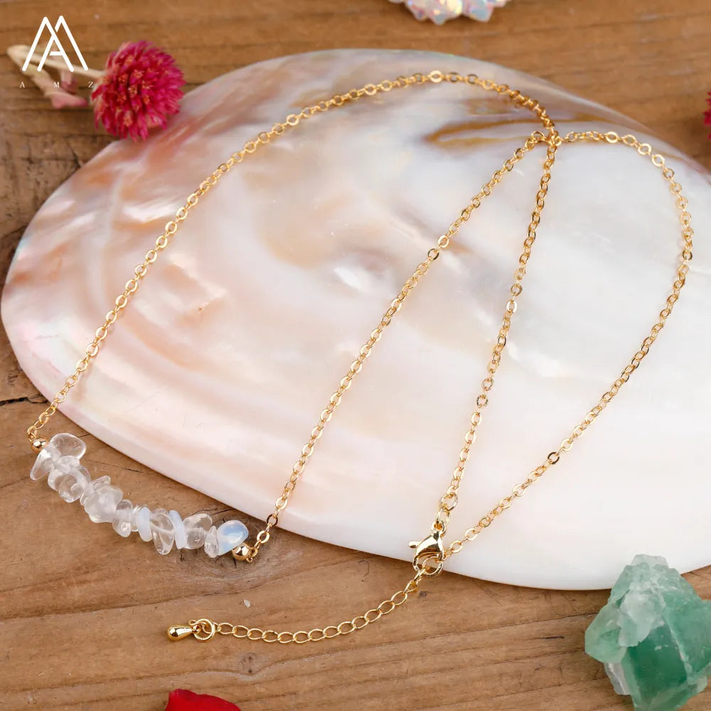 Chic Crystal Necklace featuring a trendy moon design with vibrant gemstones including turquoise, rose quartz, and opal, perfect for women.