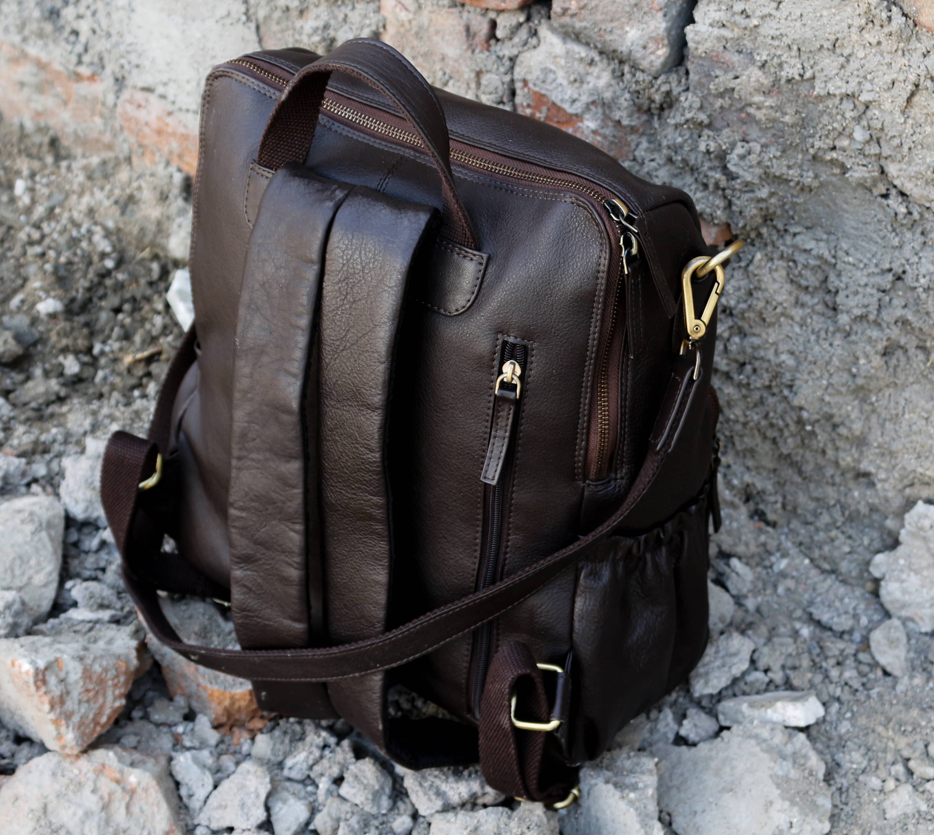 Classic leather backpack made from top-grain hides, showcasing its stylish design and spacious interior.