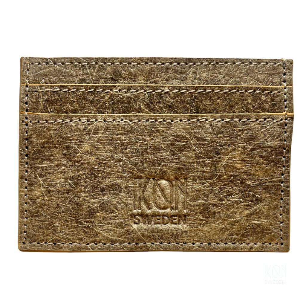 Coconut Leather Card Holder featuring minimalist design with four card slots and eco-friendly materials.