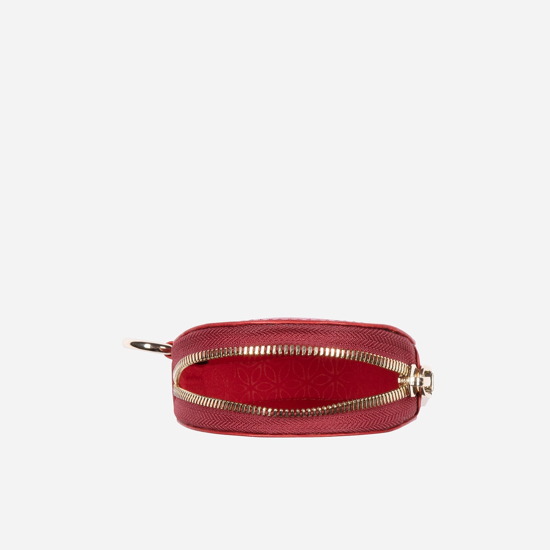 A vibrant red coin purse designed to hold coins, cards, and notes, featuring a compact and stylish design.