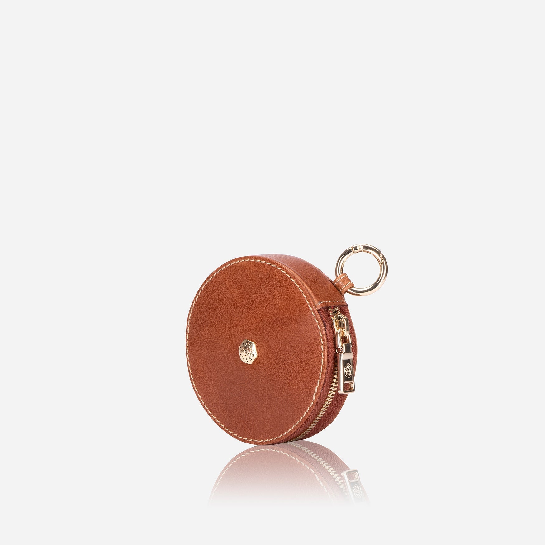 A stylish tan coin purse designed to hold notes, cards, and coins, featuring a compact design and attachment options.