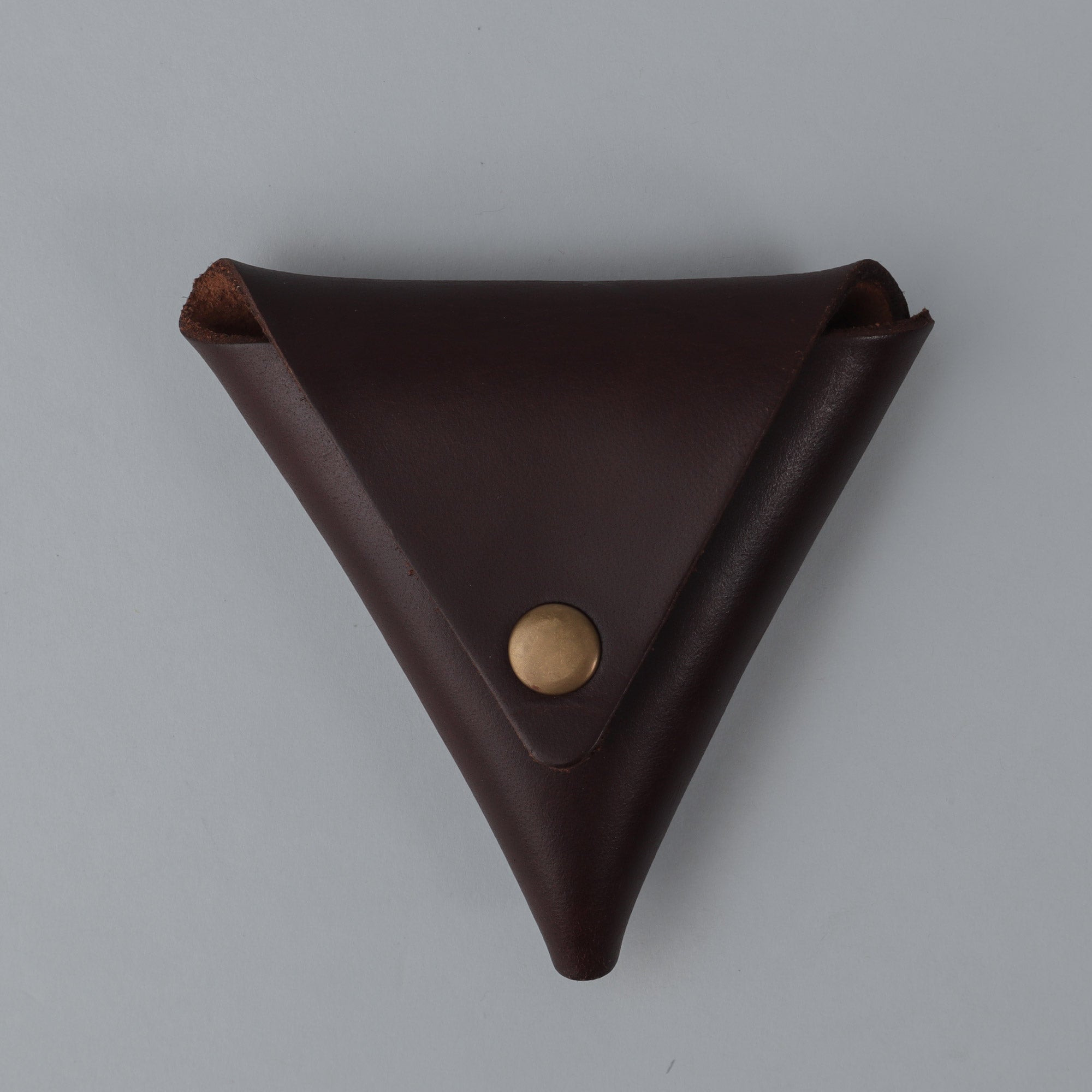 Elegant handcrafted Coins Pouch made from durable leather with antique brass hardware, perfect for carrying coins.