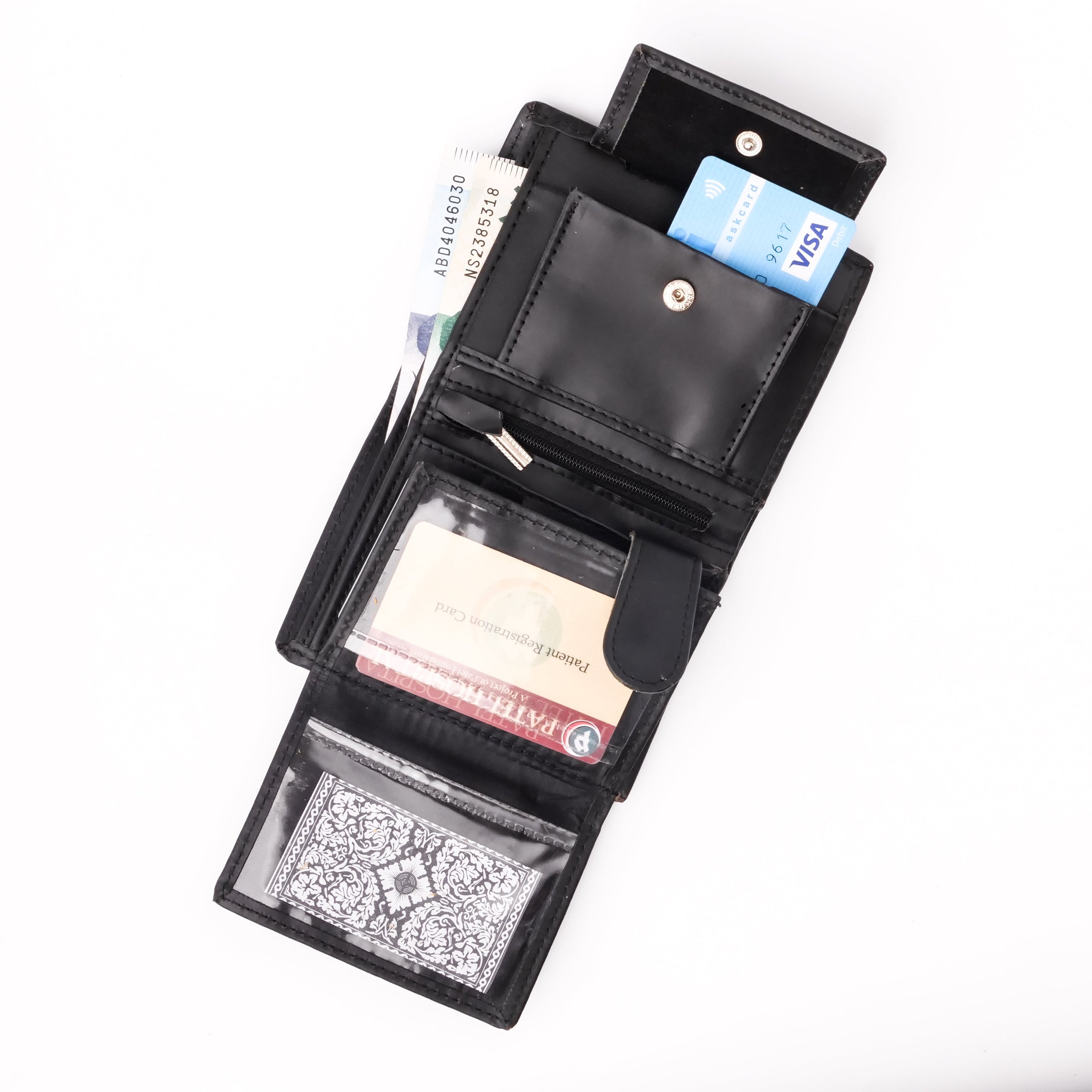 Compact Black Leather Wallet featuring multiple card slots and a coin pocket, elegantly designed for convenience and style.