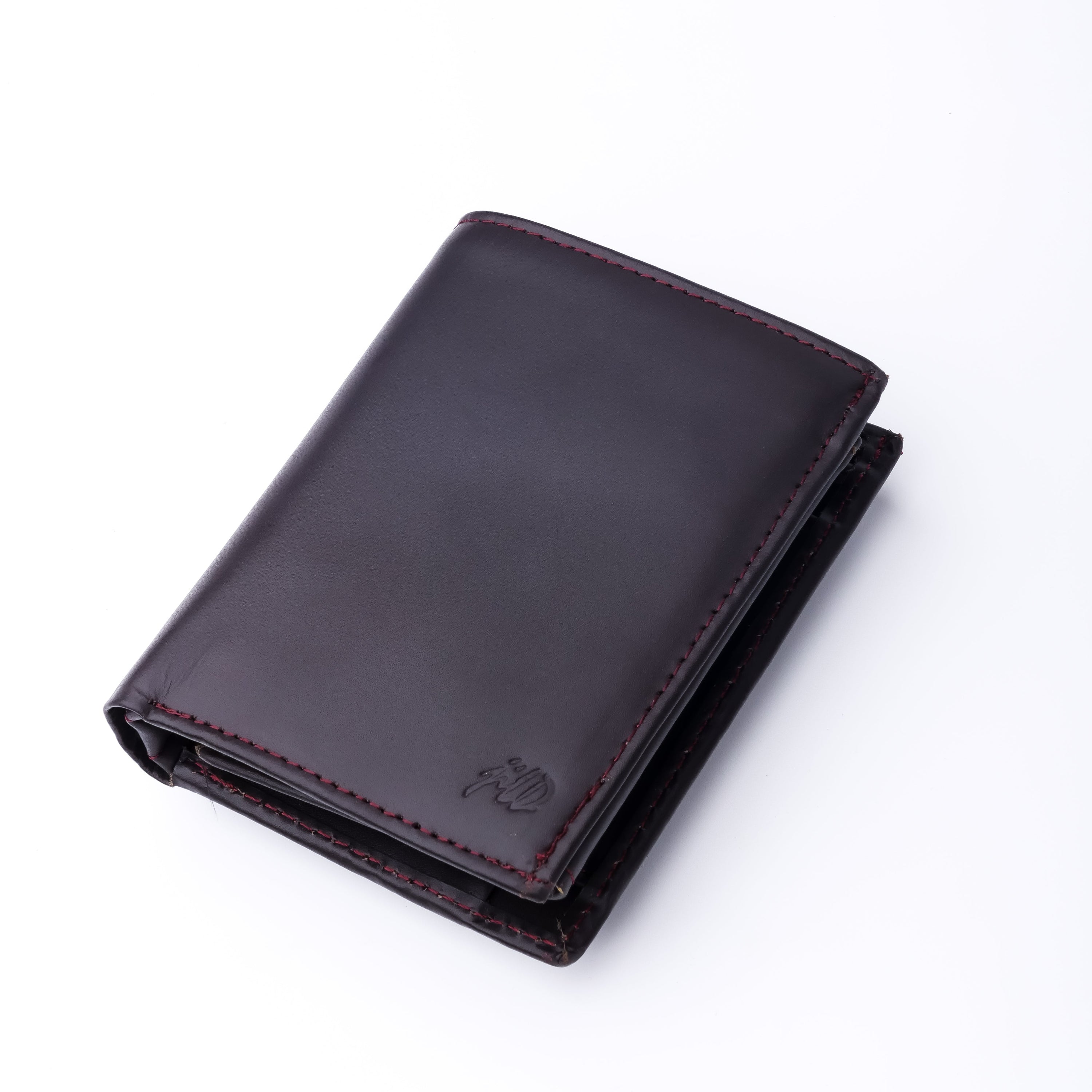 Compact burgundy leather wallet featuring multiple card slots and a coin pocket, showcasing its elegant design and functionality.