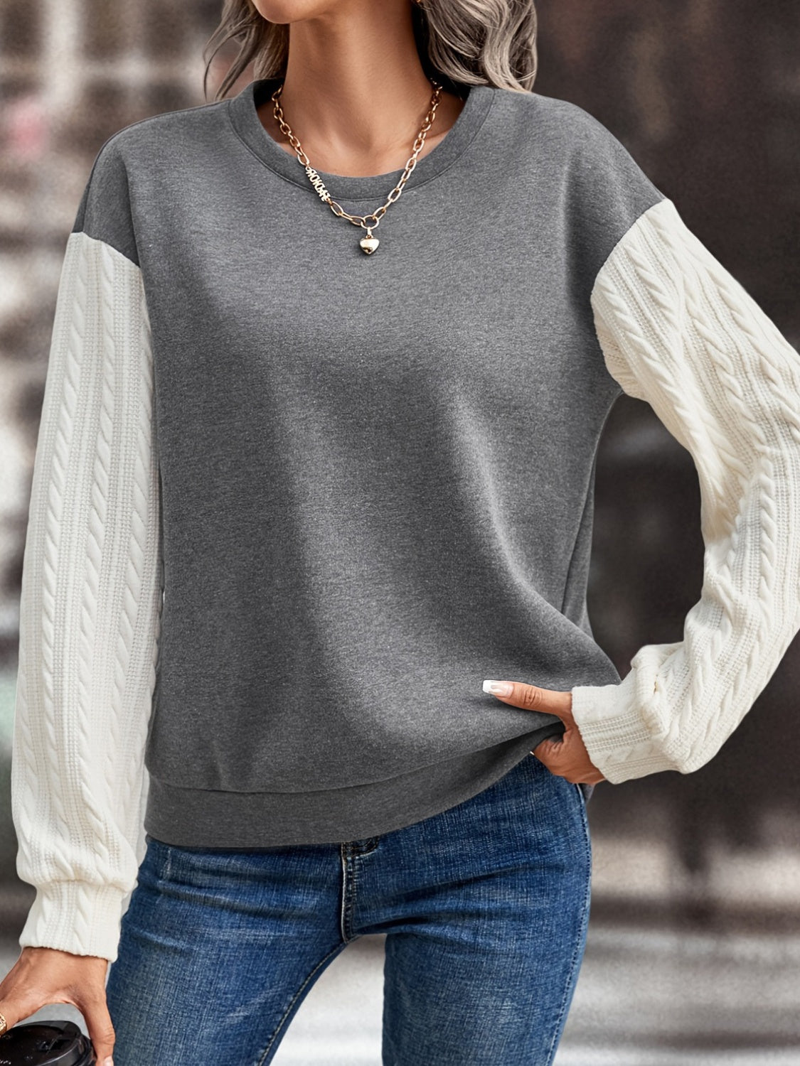 Contrast Round Neck Long Sleeve Sweatshirt in a stylish design, showcasing its round neck and long sleeves, made from 100% polyester.