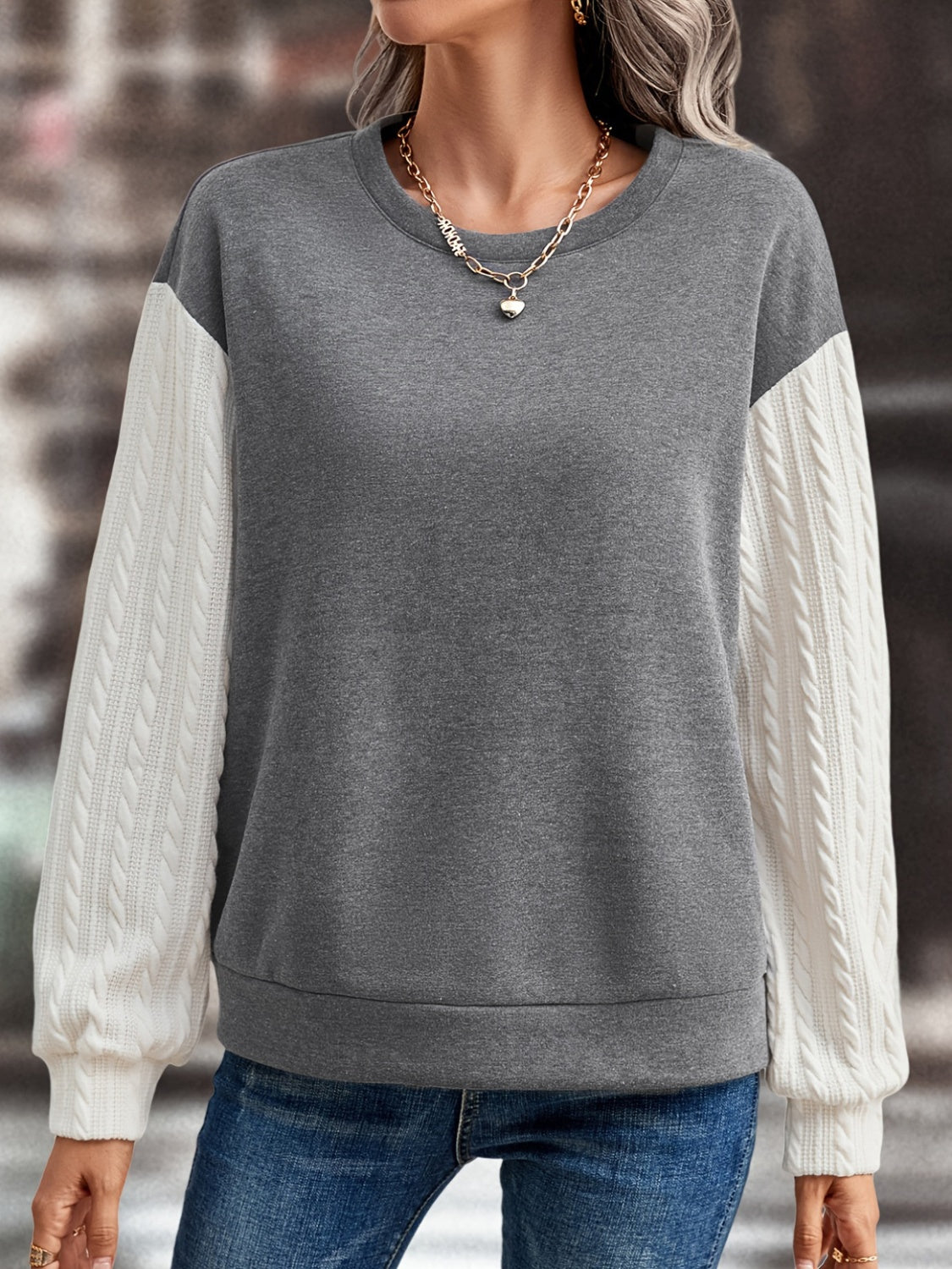 Contrast Round Neck Long Sleeve Sweatshirt in a stylish design, showcasing its round neck and long sleeves, made from 100% polyester.