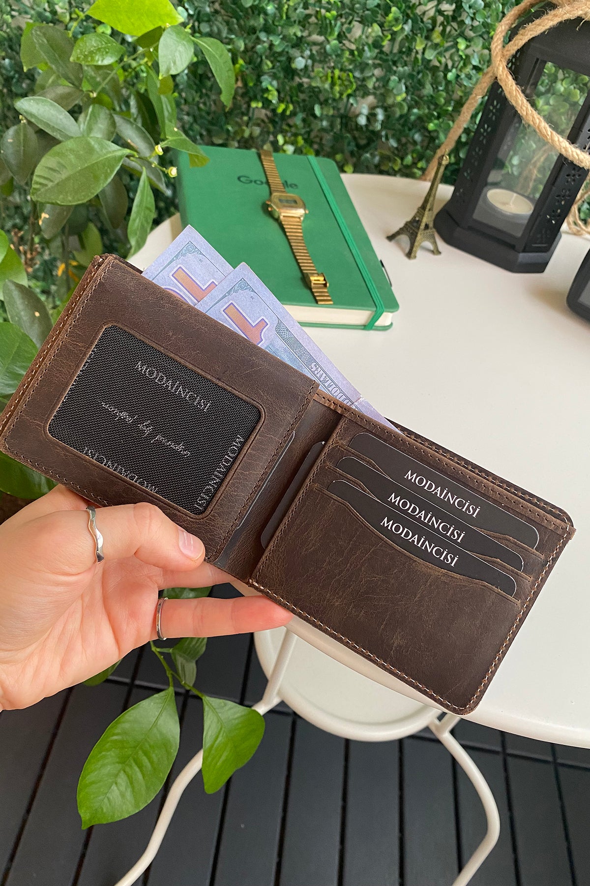 Cosmos Genuine Leather Trifold Classic Men's Wallet in various colors, showcasing its sleek design and high-quality leather.