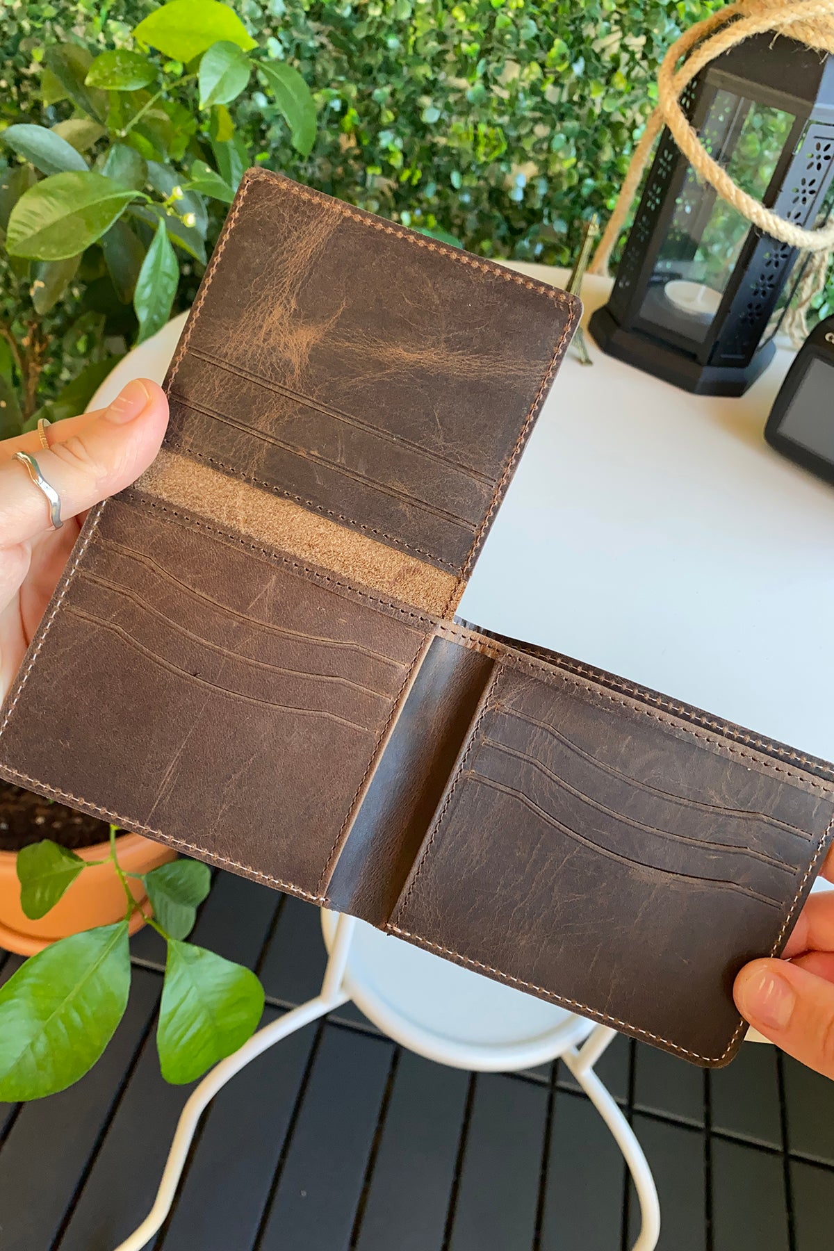 Cosmos Genuine Leather Trifold Classic Men's Wallet in various colors, showcasing its sleek design and high-quality leather.