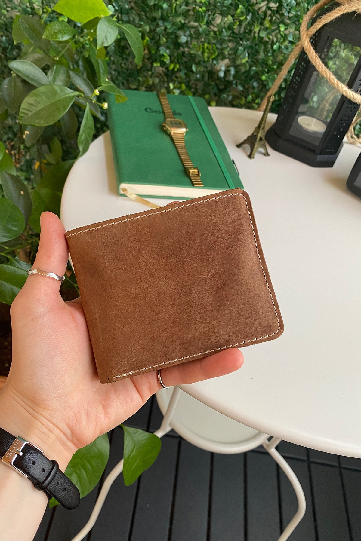 Cosmos Genuine Leather Trifold Classic Men's Wallet in various colors, showcasing its sleek design and high-quality leather.