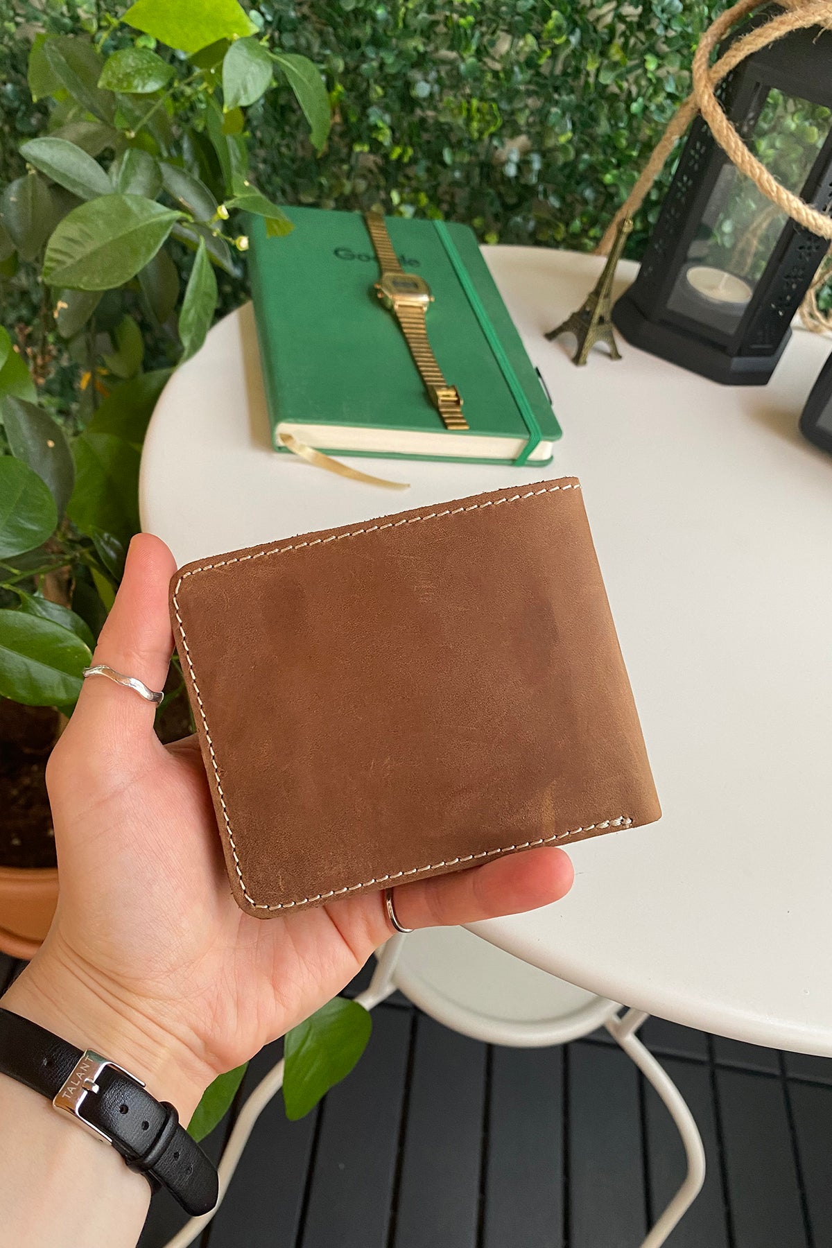 Cosmos Genuine Leather Trifold Classic Men's Wallet in various colors, showcasing its sleek design and high-quality leather.