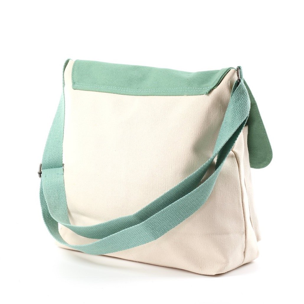 Stylish two-tone cross body bag made of durable canvas, featuring adjustable strap and multiple pockets.