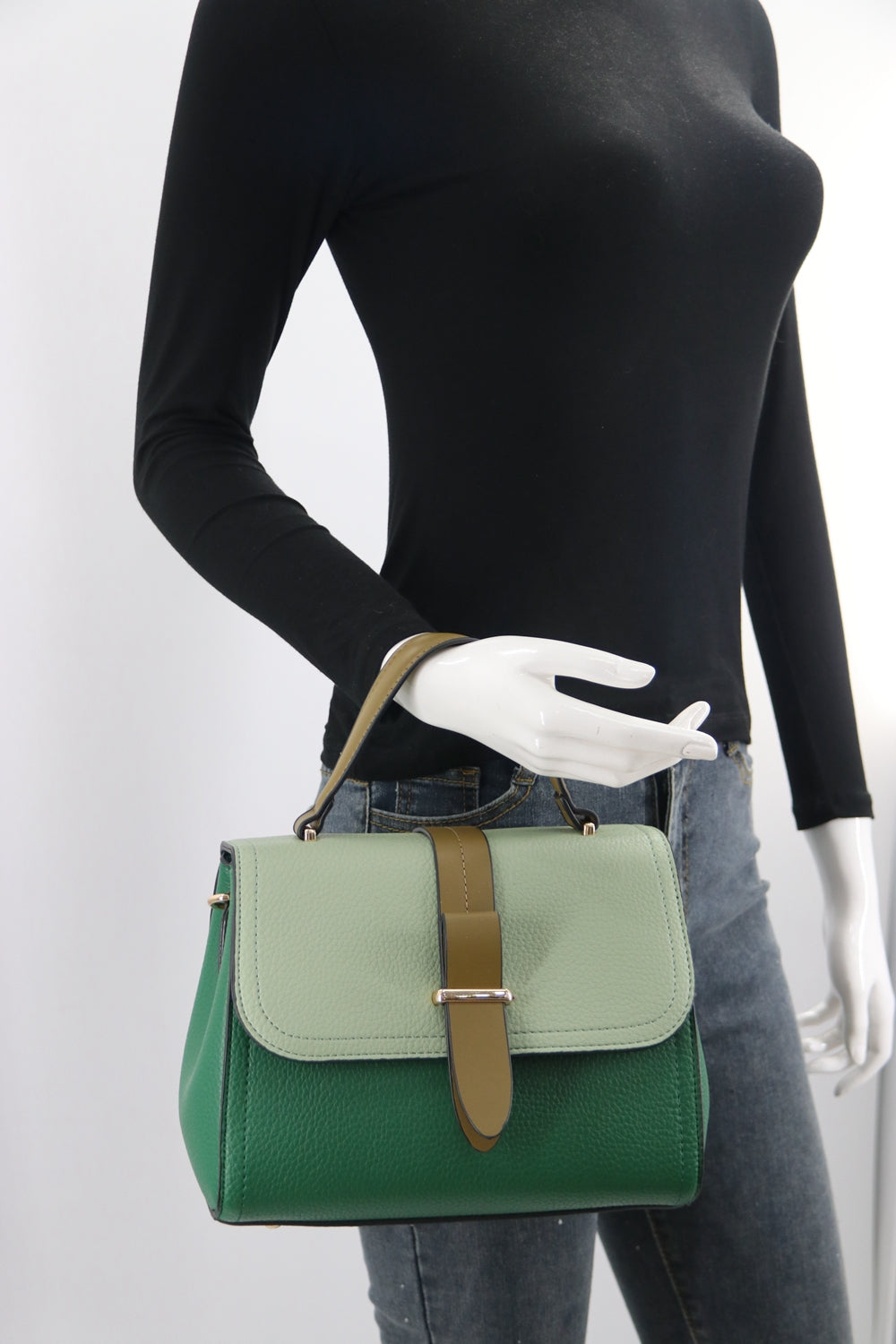 Crossbody C1965 bag featuring a modern design with adjustable strap and multiple compartments.