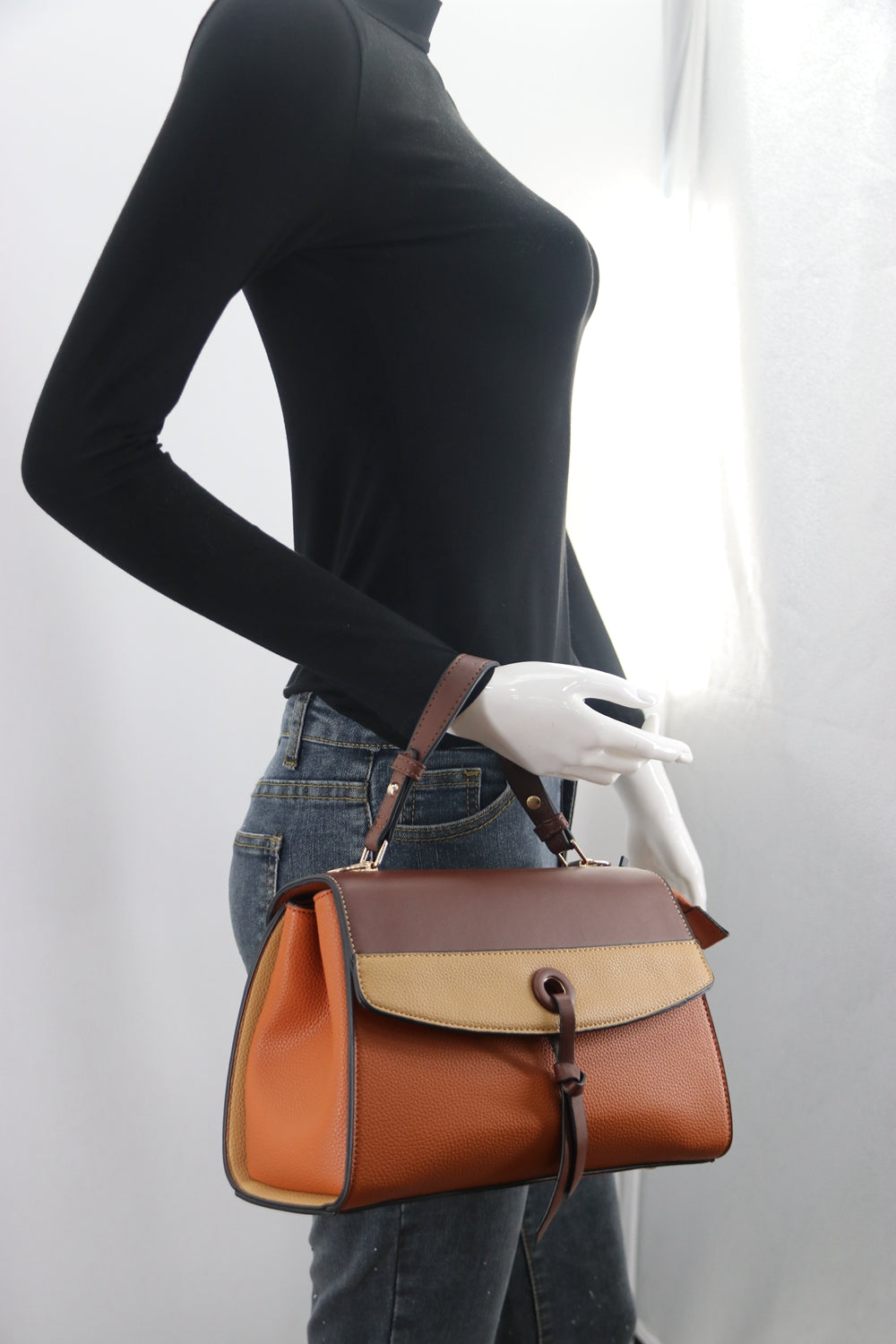 Stylish Crossbody C1967 bag in various colors with adjustable strap.