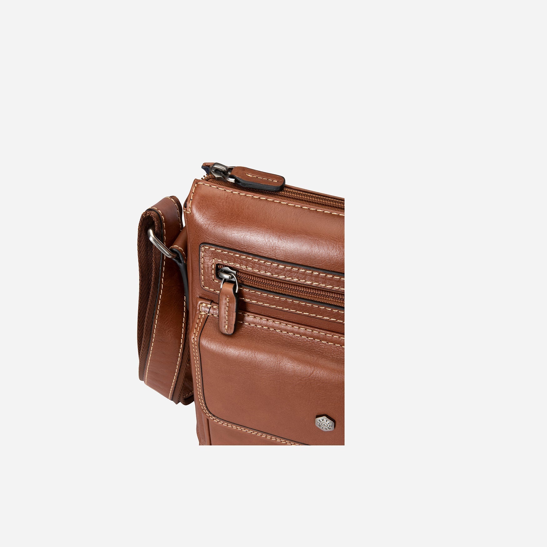 Colt Crossbody Organiser Bag with adjustable straps and RFID pocket, showcasing its spacious interior and stylish design.