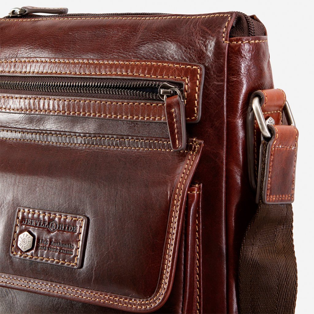 Crossbody Organiser Bag in Tobacco color with zip top and RFID pocket, ideal for secure travel and everyday use.