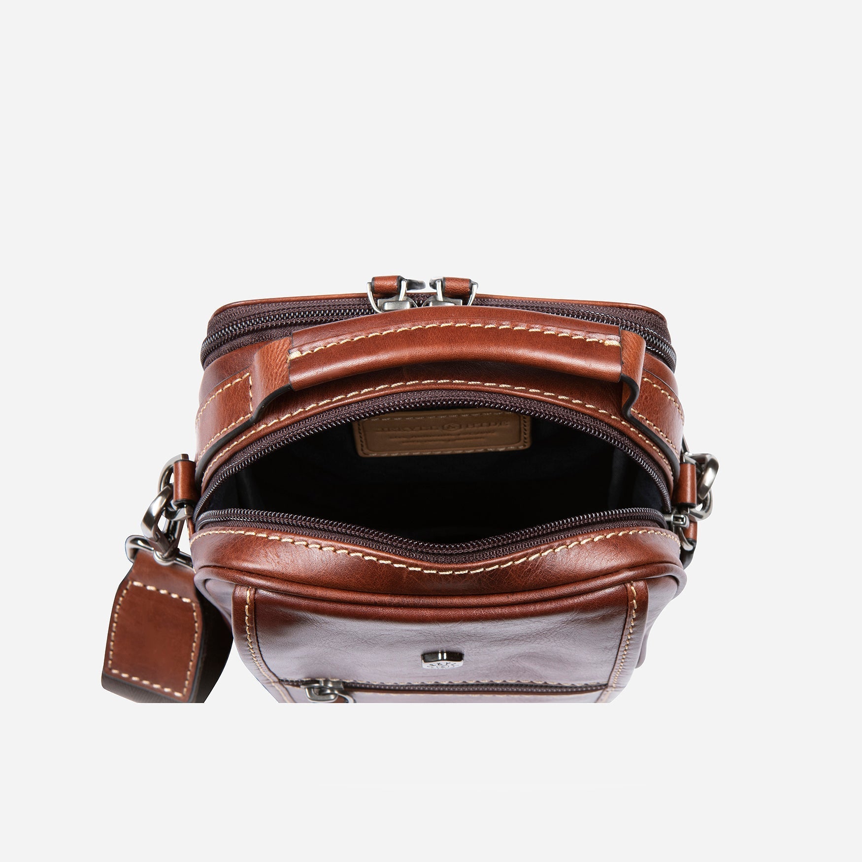 Stylish tobacco crossbody bag with adjustable strap and spacious interior.