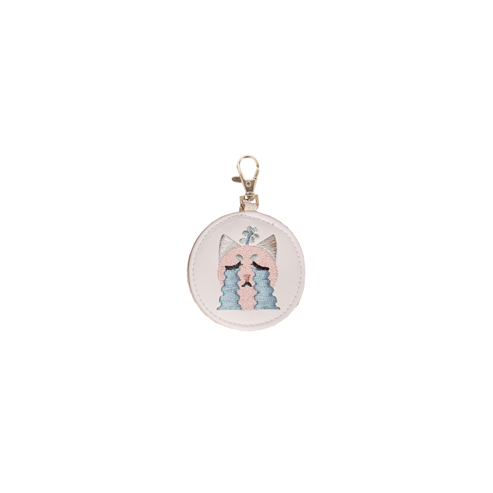 Crying Cat Bag Charm featuring an adorable cat with a crying expression, perfect for cat lovers.