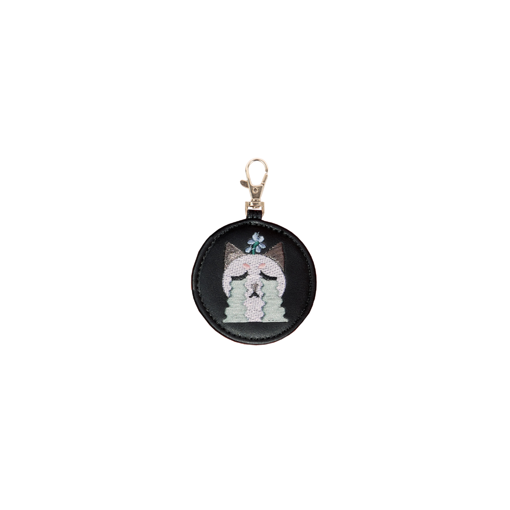 Crying Cat Bag Charm featuring an adorable cat with a crying expression, perfect for cat lovers.