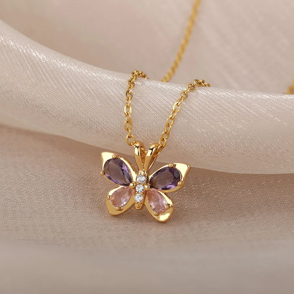 A delicate Cute Crystal Butterfly Necklace featuring a sparkling butterfly pendant on a stainless steel link chain, perfect for women.