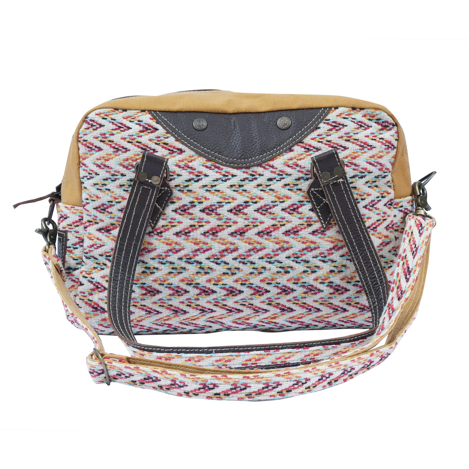 A stylish Dashing Duffle Bag made from rug, leather, and upcycled canvas, showcasing its unique design and vibrant colors.