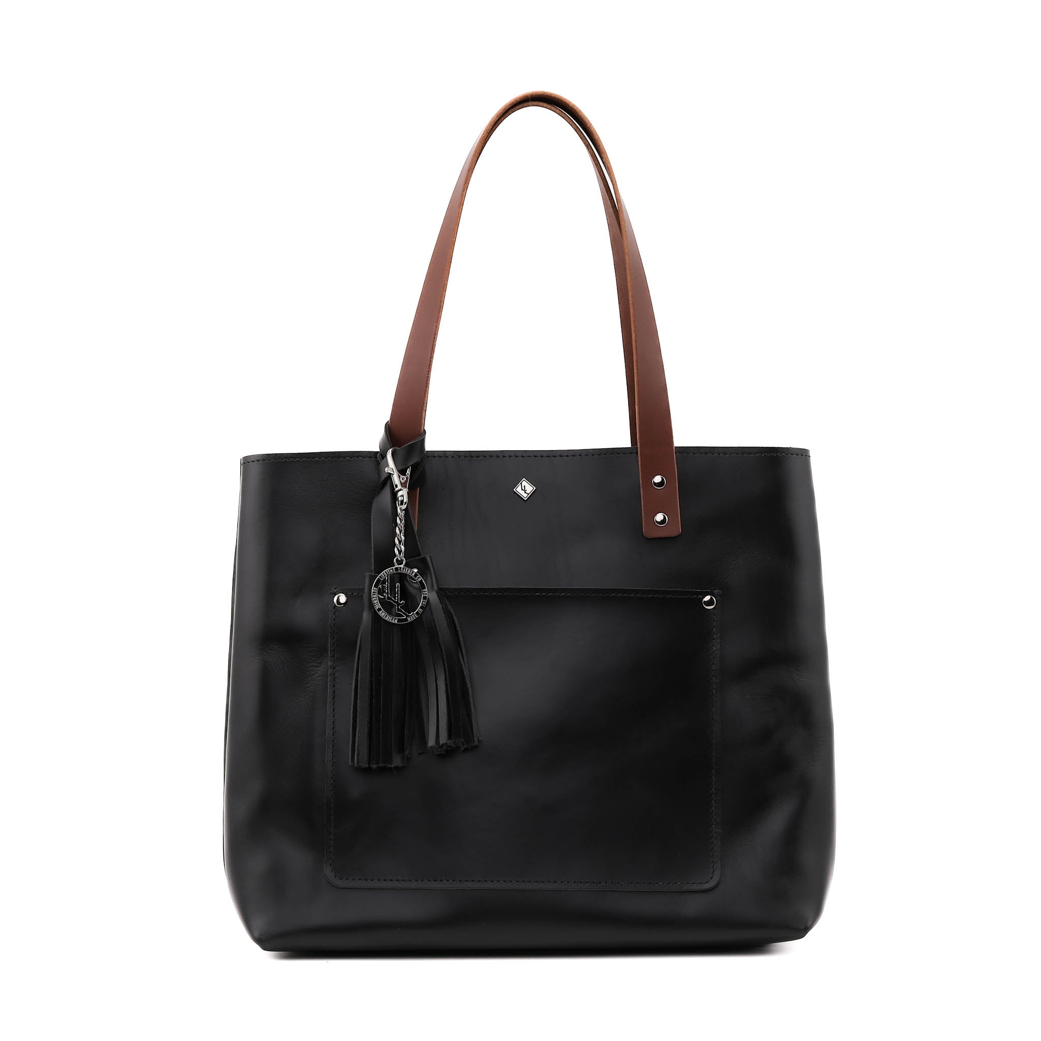 Deluxe Lifetime Tote in premium dyed leather, spacious design with interior pockets, perfect for everyday use.