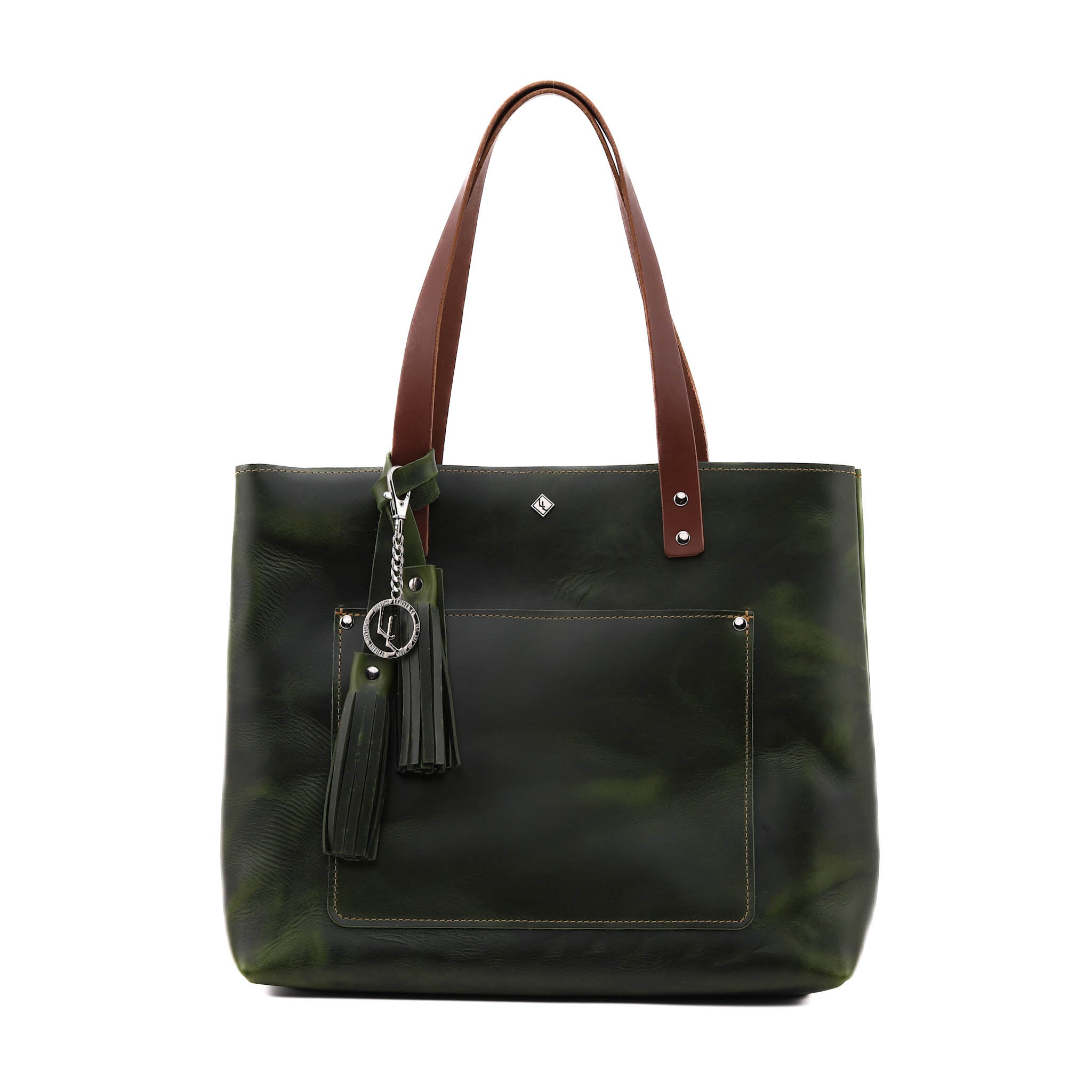 Deluxe Lifetime Tote in premium dyed leather, spacious design with interior pockets, perfect for everyday use.