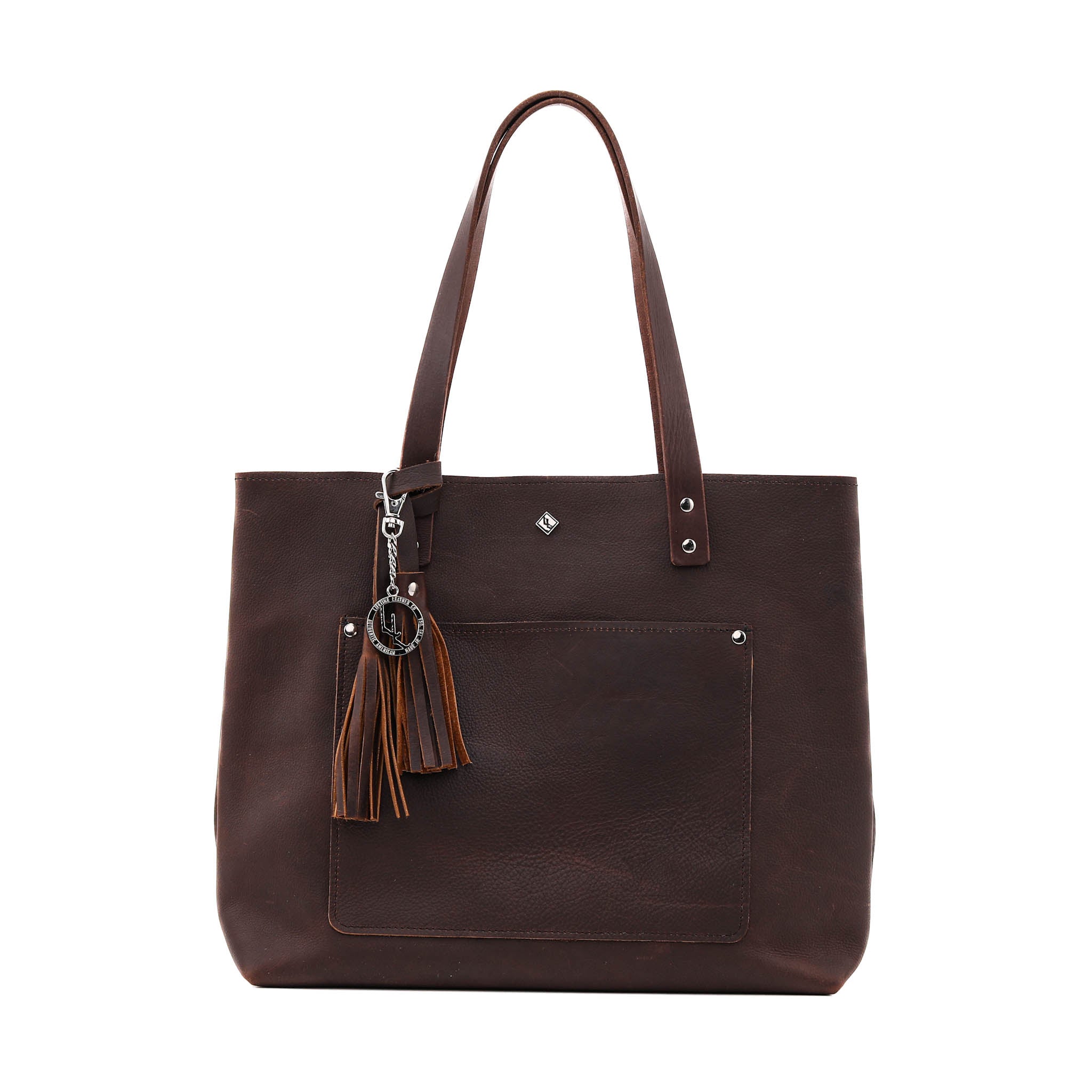 Deluxe Lifetime Tote in premium dyed leather, spacious design with interior pockets, perfect for everyday use.