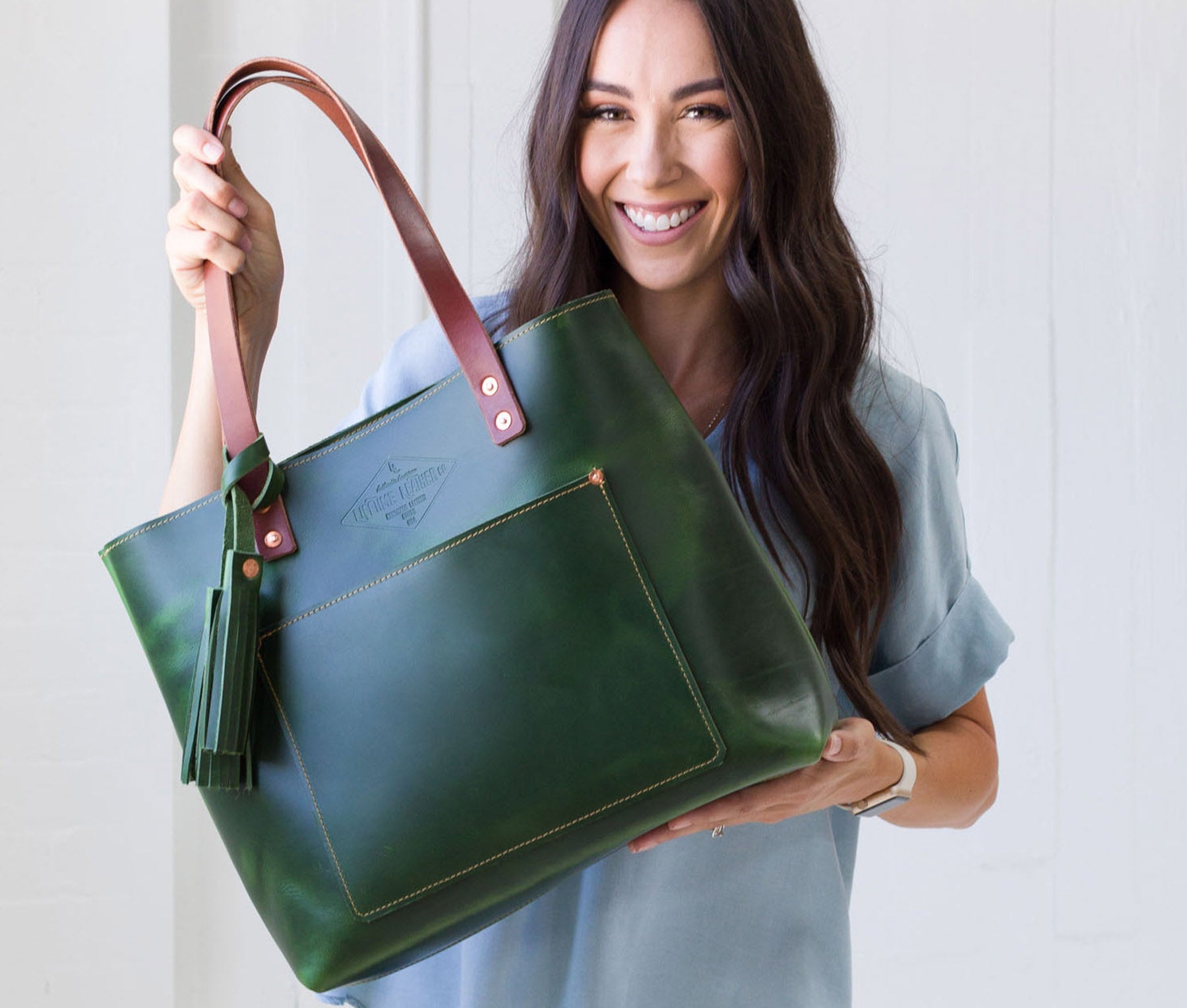 Deluxe Lifetime Tote in premium dyed leather, spacious design with interior pockets, perfect for everyday use.