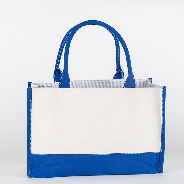 Deluxe Market Tote in heavyweight canvas with contrasting trim colors, featuring a boxy design and interior pocket.