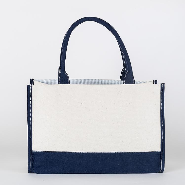 Deluxe Market Tote in heavyweight canvas with contrasting trim colors, featuring a boxy design and interior pocket.