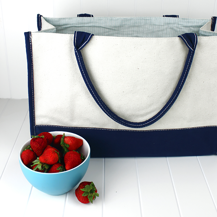 Deluxe Market Tote in heavyweight canvas with contrasting trim colors, featuring a boxy design and interior pocket.