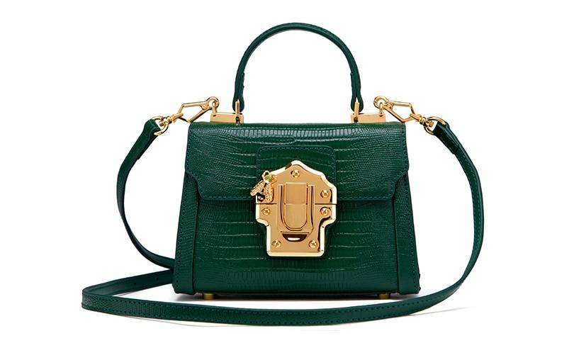 Designer Serpentine Lock Handbag made of split leather, featuring a stylish serpentine pattern and lock decoration, available in multiple colors.