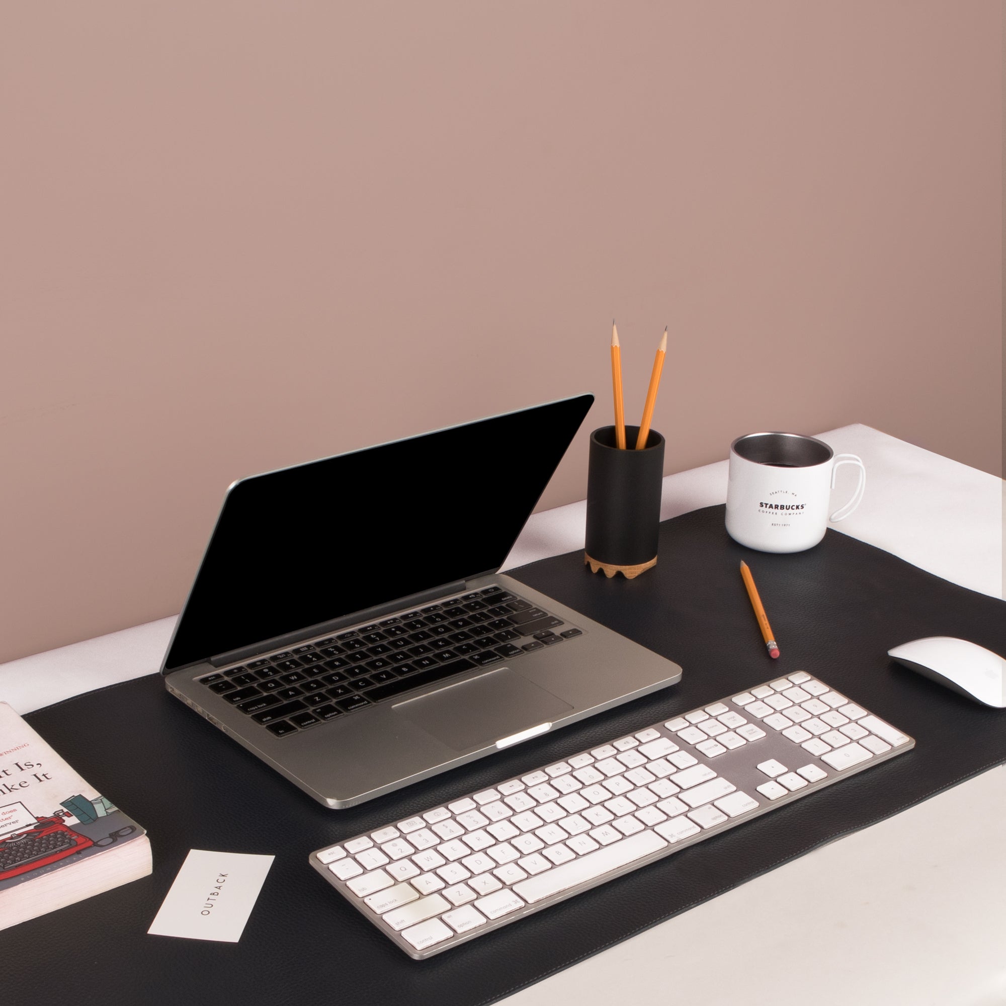 A luxurious desk mat made from premium full grain leather, featuring a smooth surface and burnished edges, perfect for enhancing any workspace.