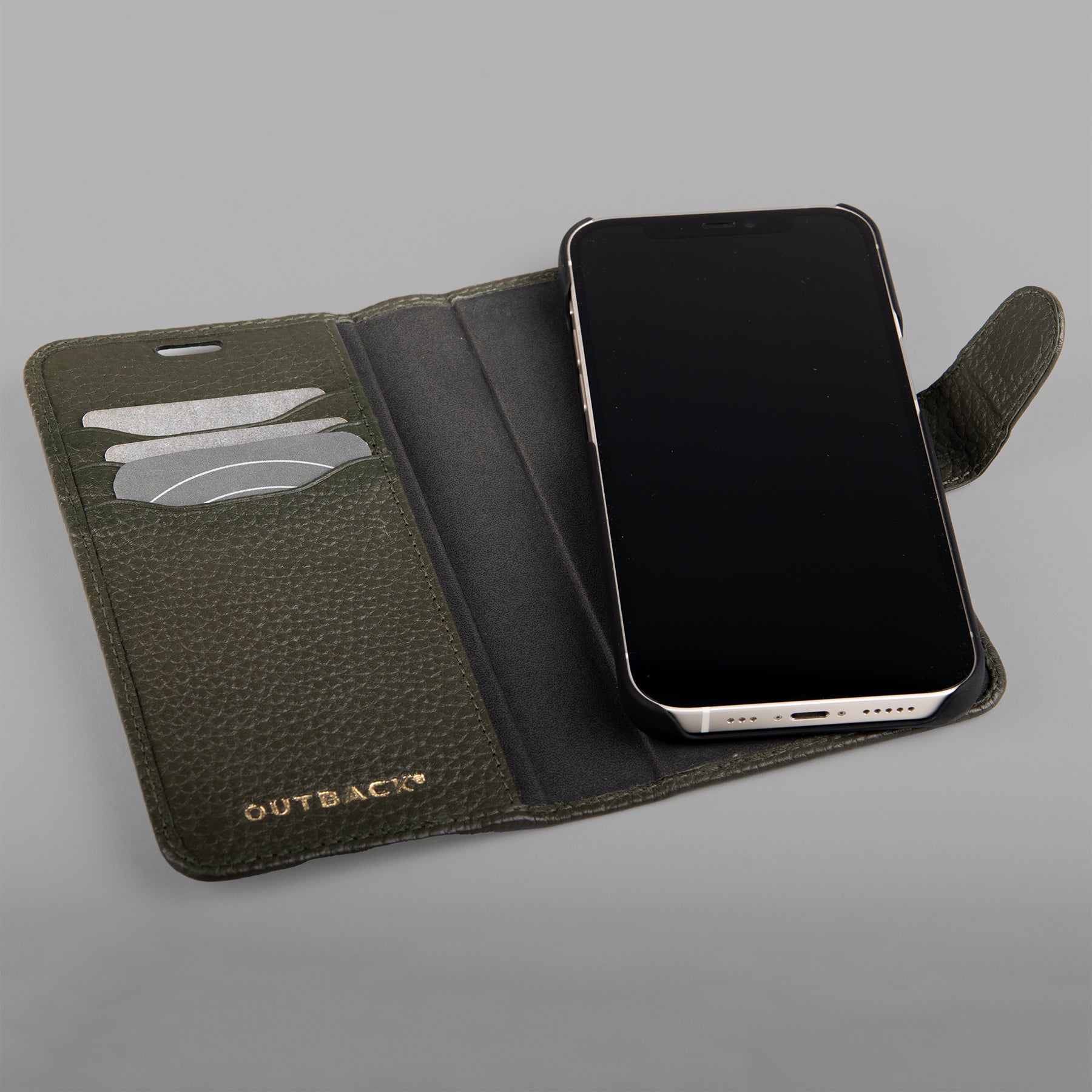 A stylish detachable iPhone case made of premium full-grain leather, featuring credit card slots and a currency pocket, showcasing its sleek design.