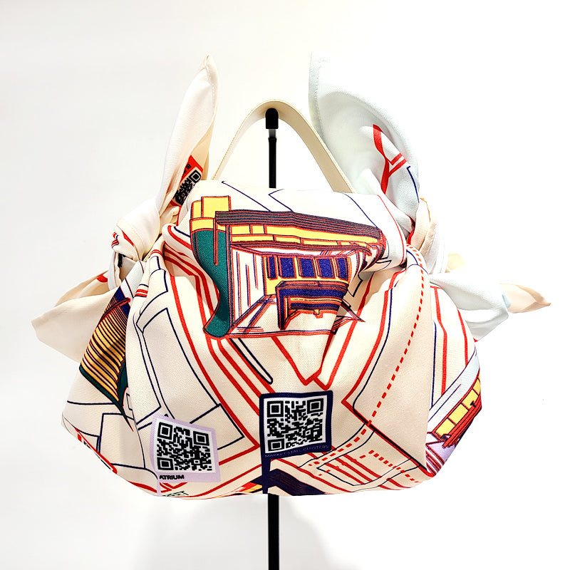 DiSCARVERY Wrap Bag featuring a colorful map print, designed for eco-friendly travel and shopping, showcasing QR codes for interactive experiences.