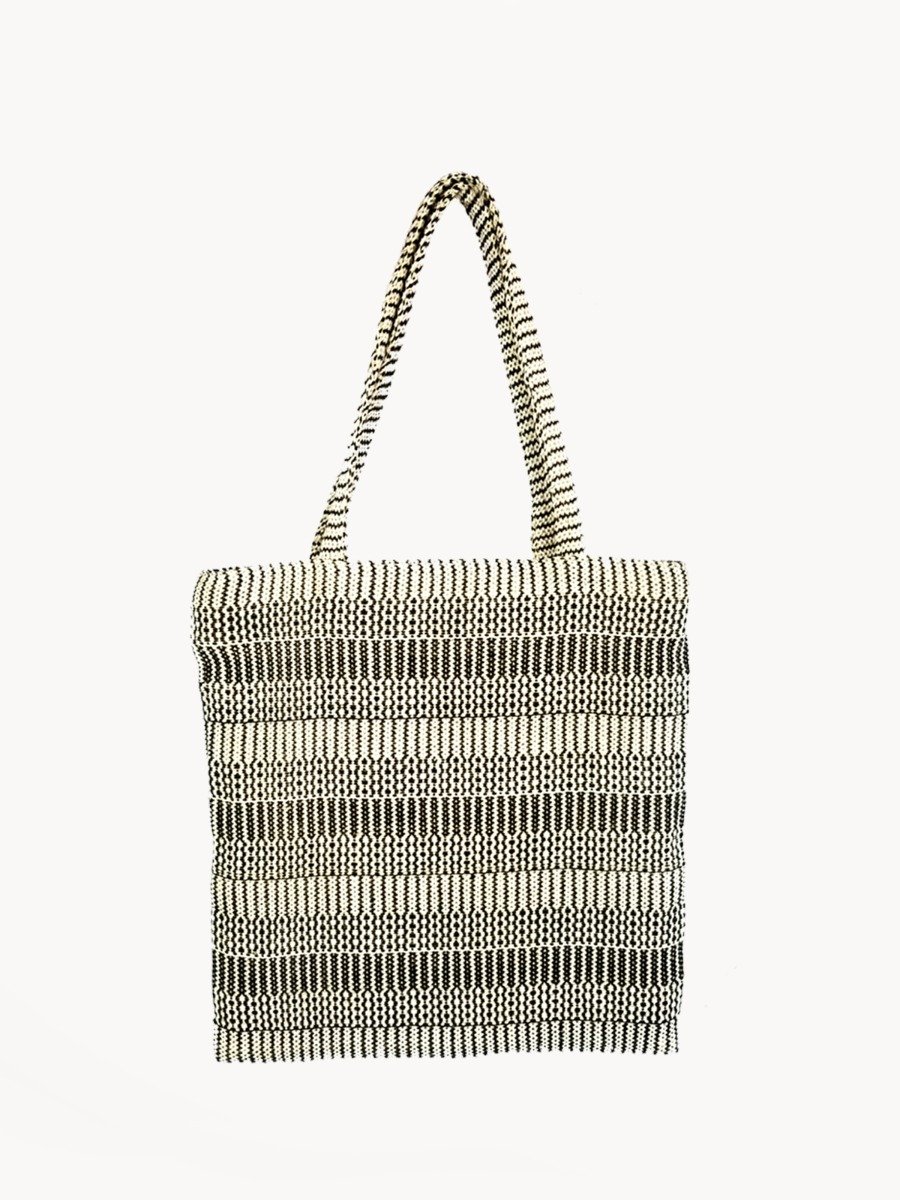 Dobi Daily Bag in Black, made from handwoven jute-cotton fabric with soft handles, perfect for everyday use.