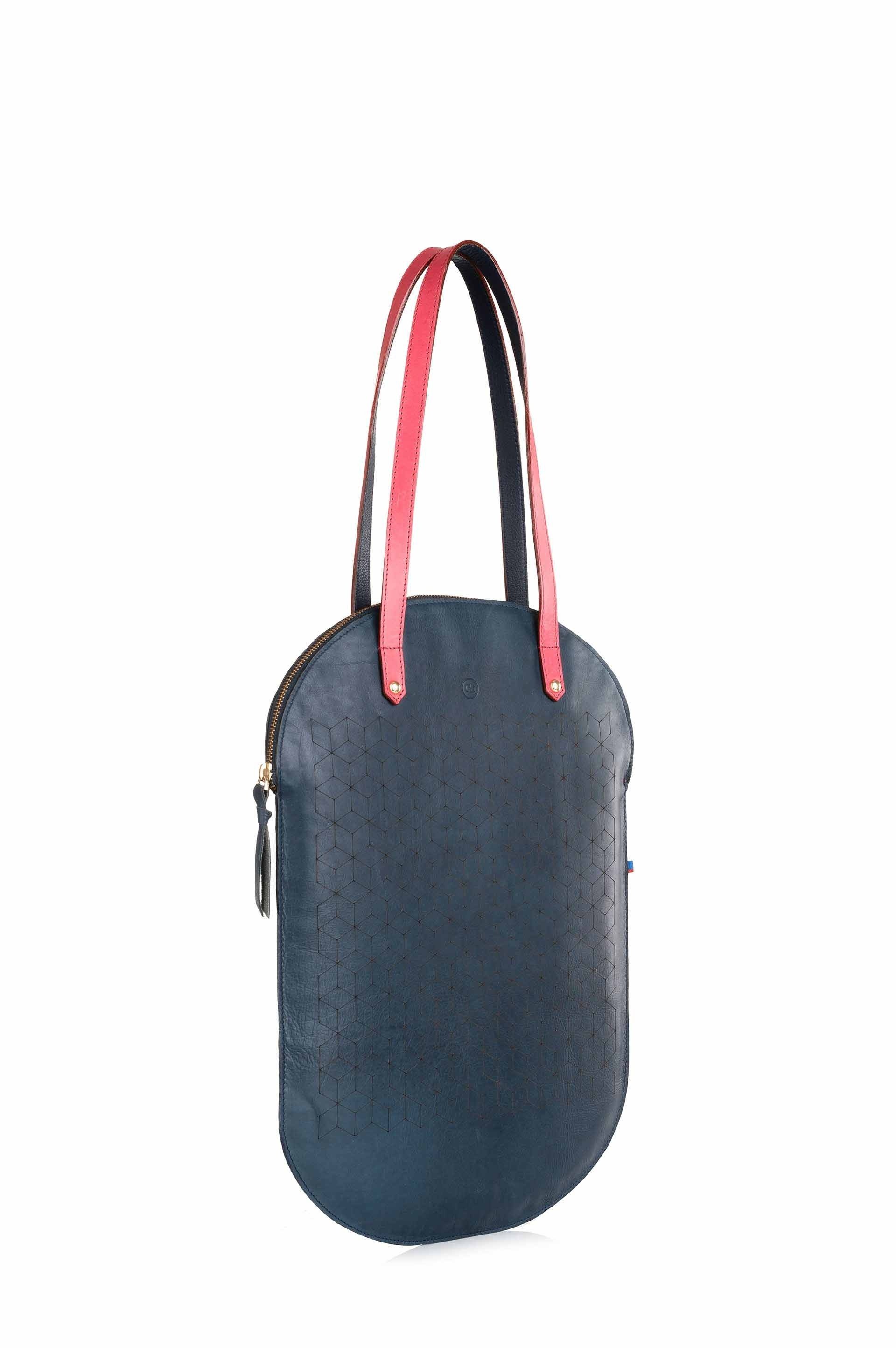 DOMUS Tote featuring elegant leather and tessellation design, perfect for brunch or daily use.