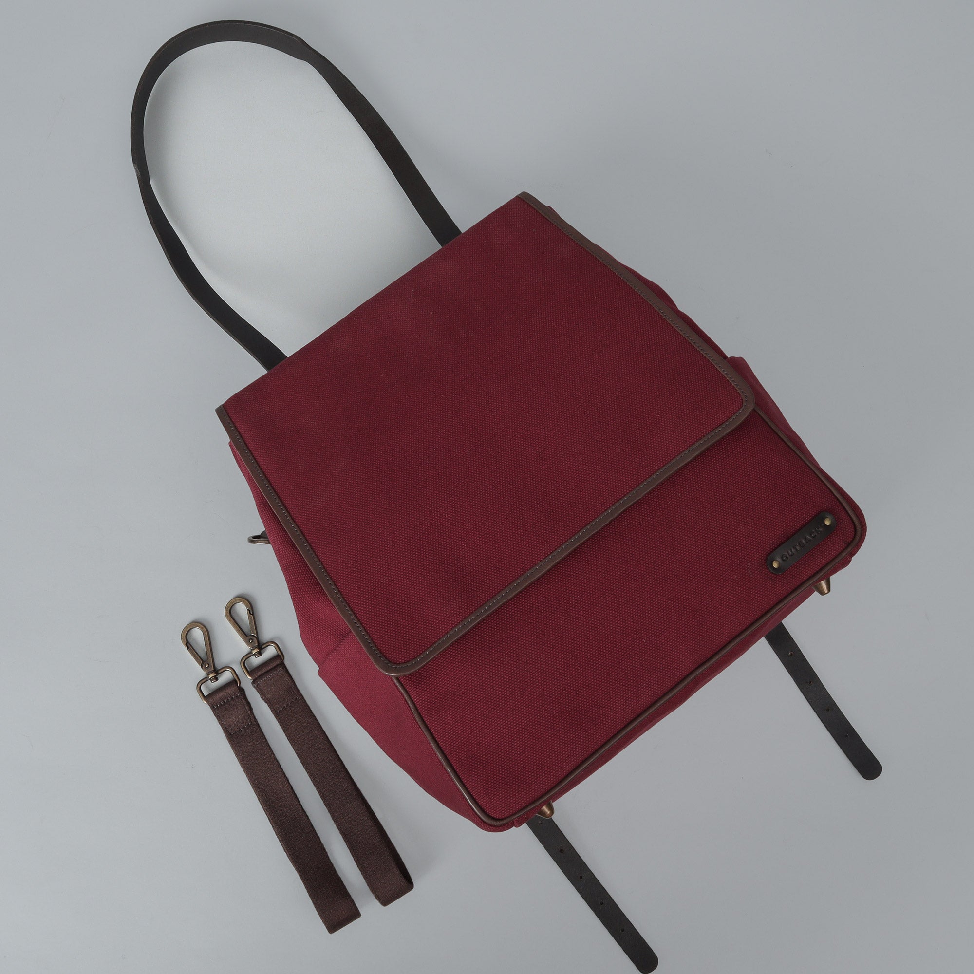 Donna Canvas Diaper Bag in stylish design with multiple pockets and durable materials, perfect for parents on the go.