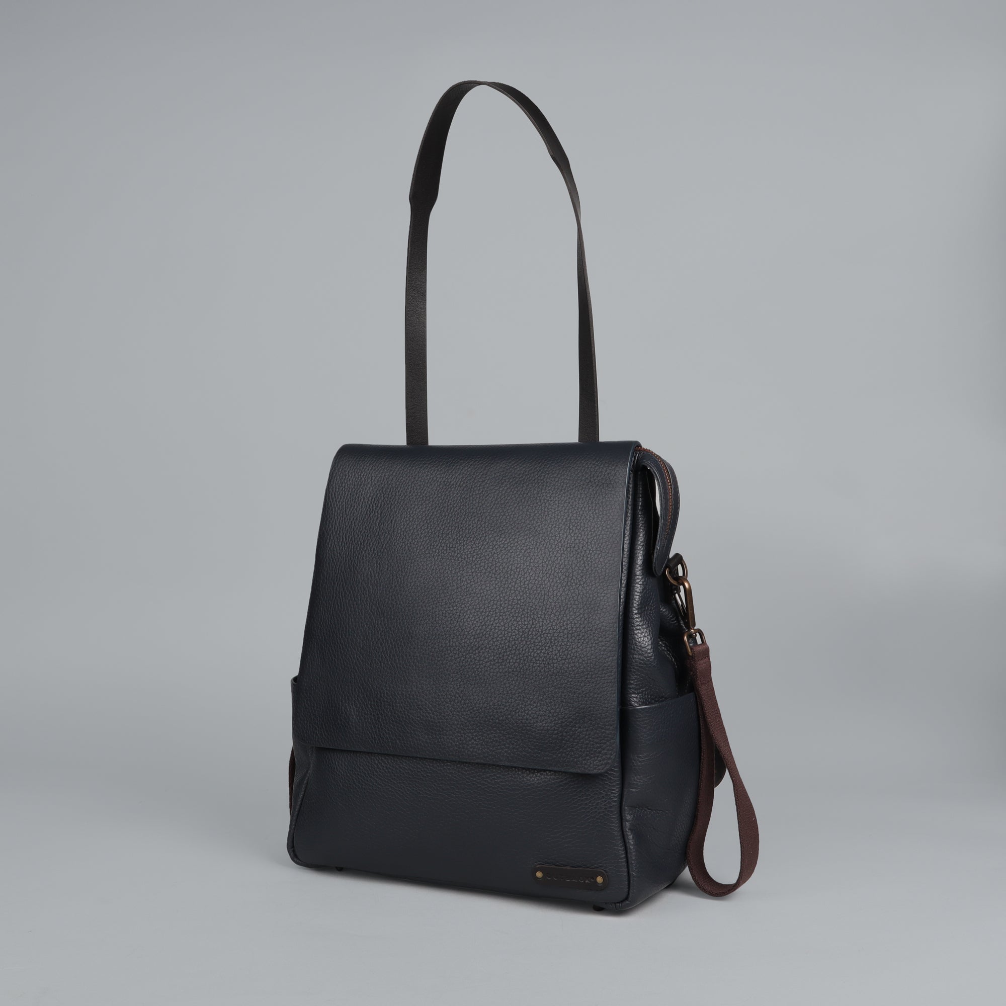 Donna Leather Diaper Bag in premium full grain leather with multiple pockets and stylish design.