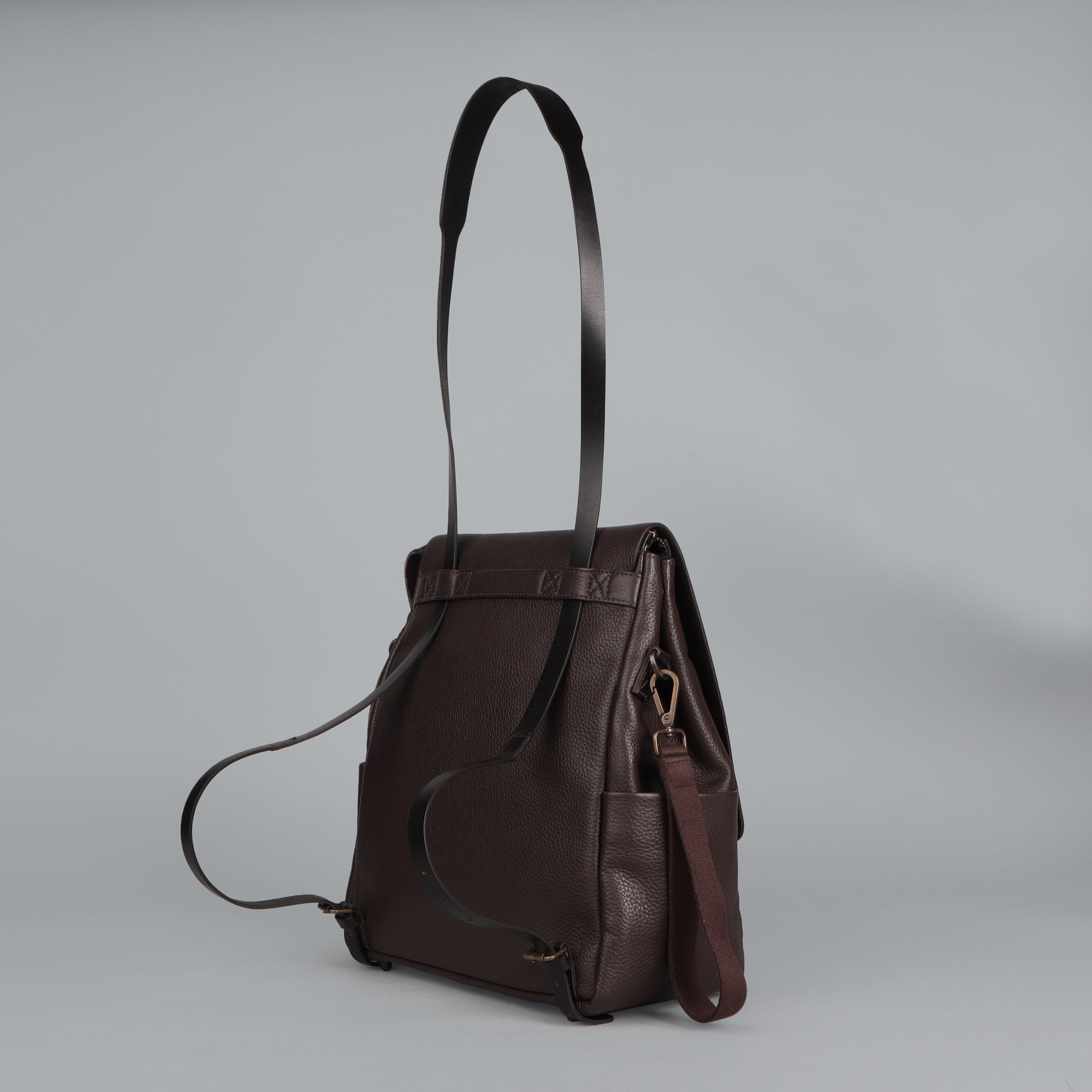 Donna Leather Diaper Bag in premium full grain leather with multiple pockets and versatile carrying options.