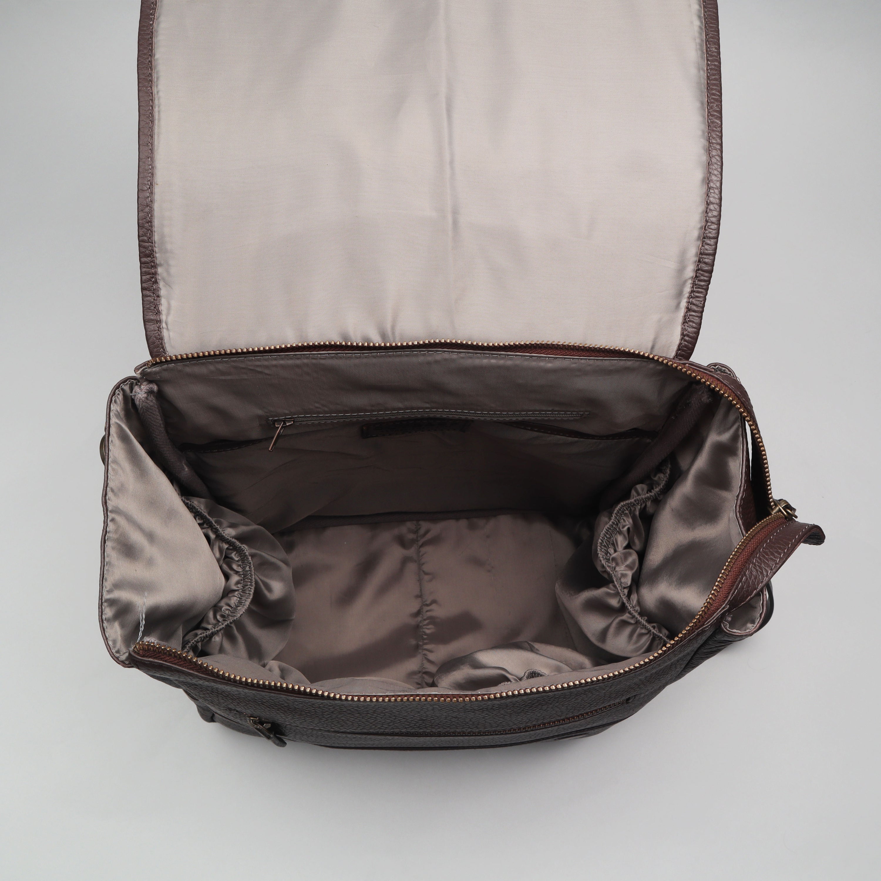 Donna Leather Diaper Bag in premium full grain leather with multiple pockets and versatile carrying options.