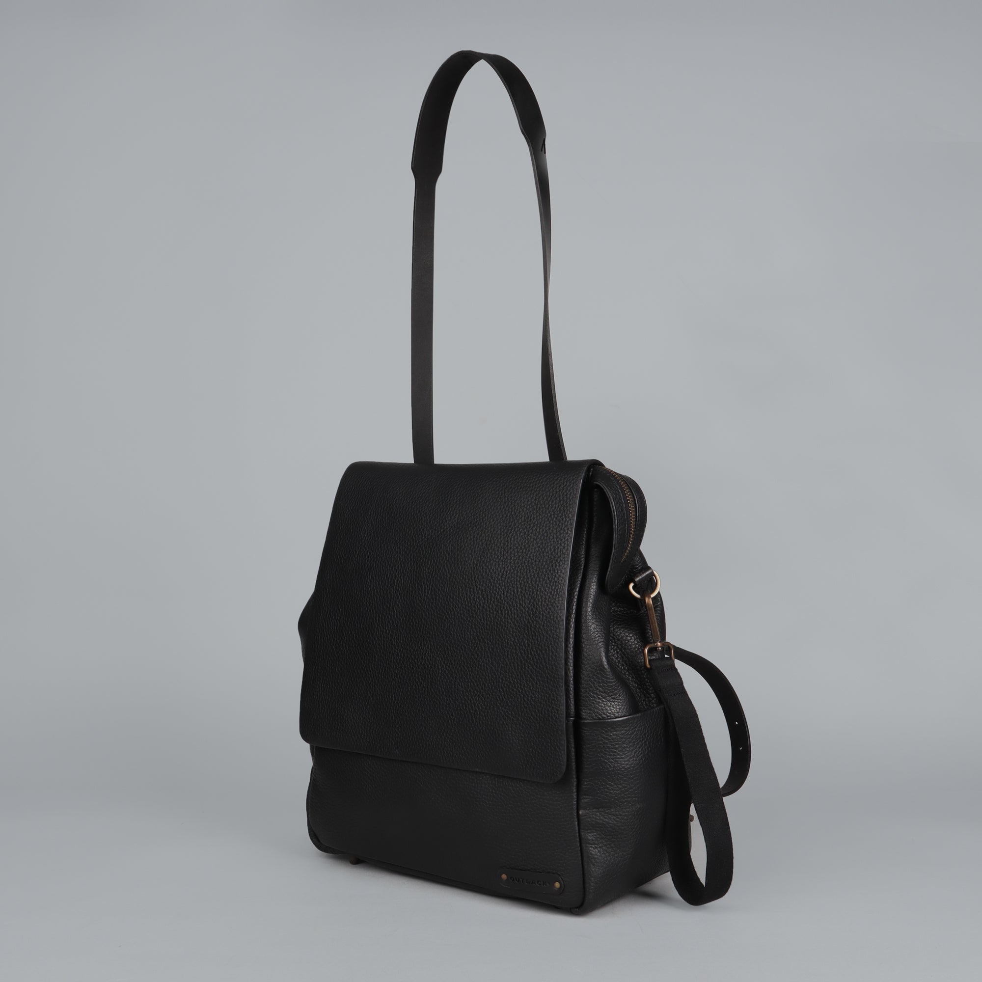 Donna Leather Diaper Bag in premium full grain leather with multiple pockets and versatile carrying options.